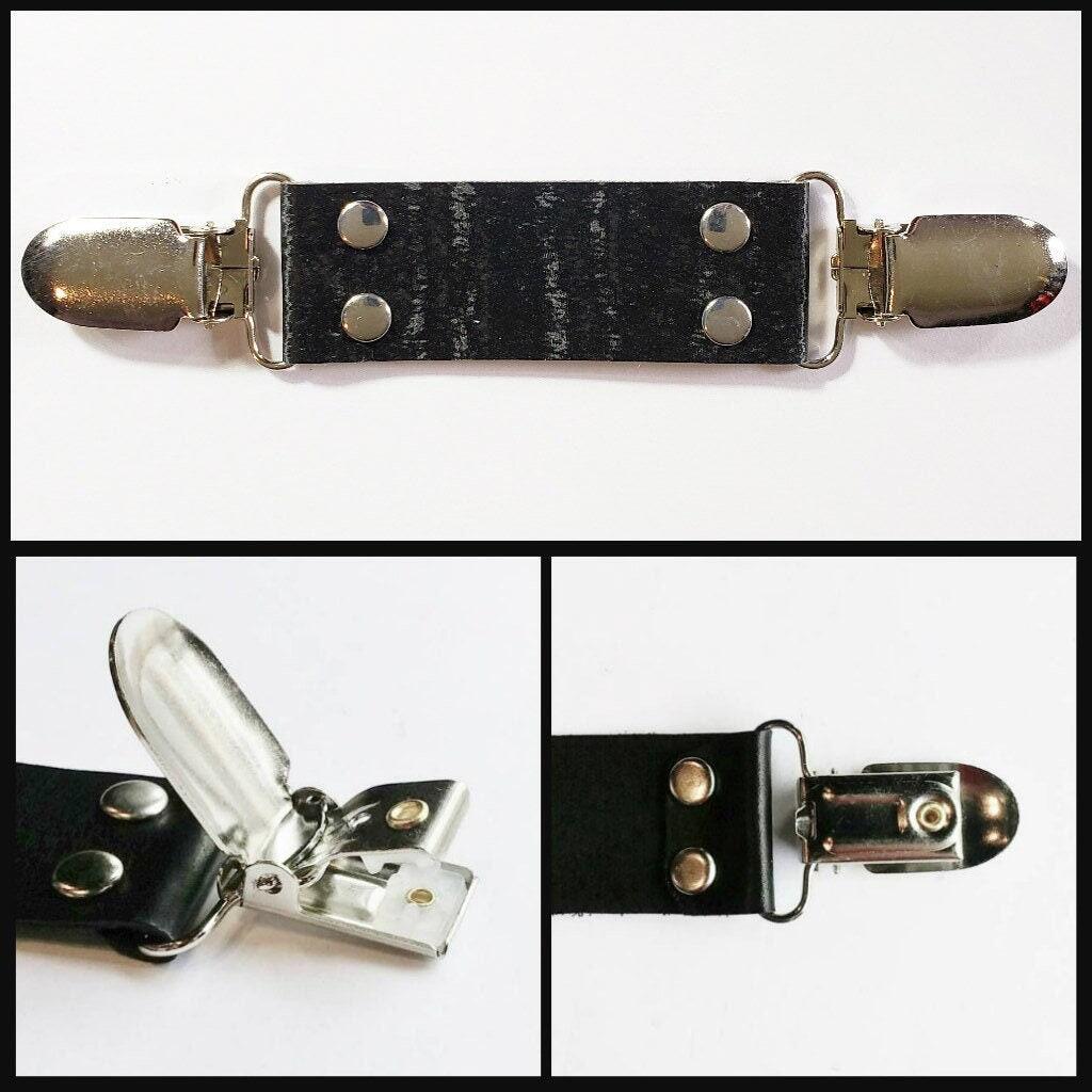 Black leather cinch clip with bronze tone clips & o-ring. Shirt