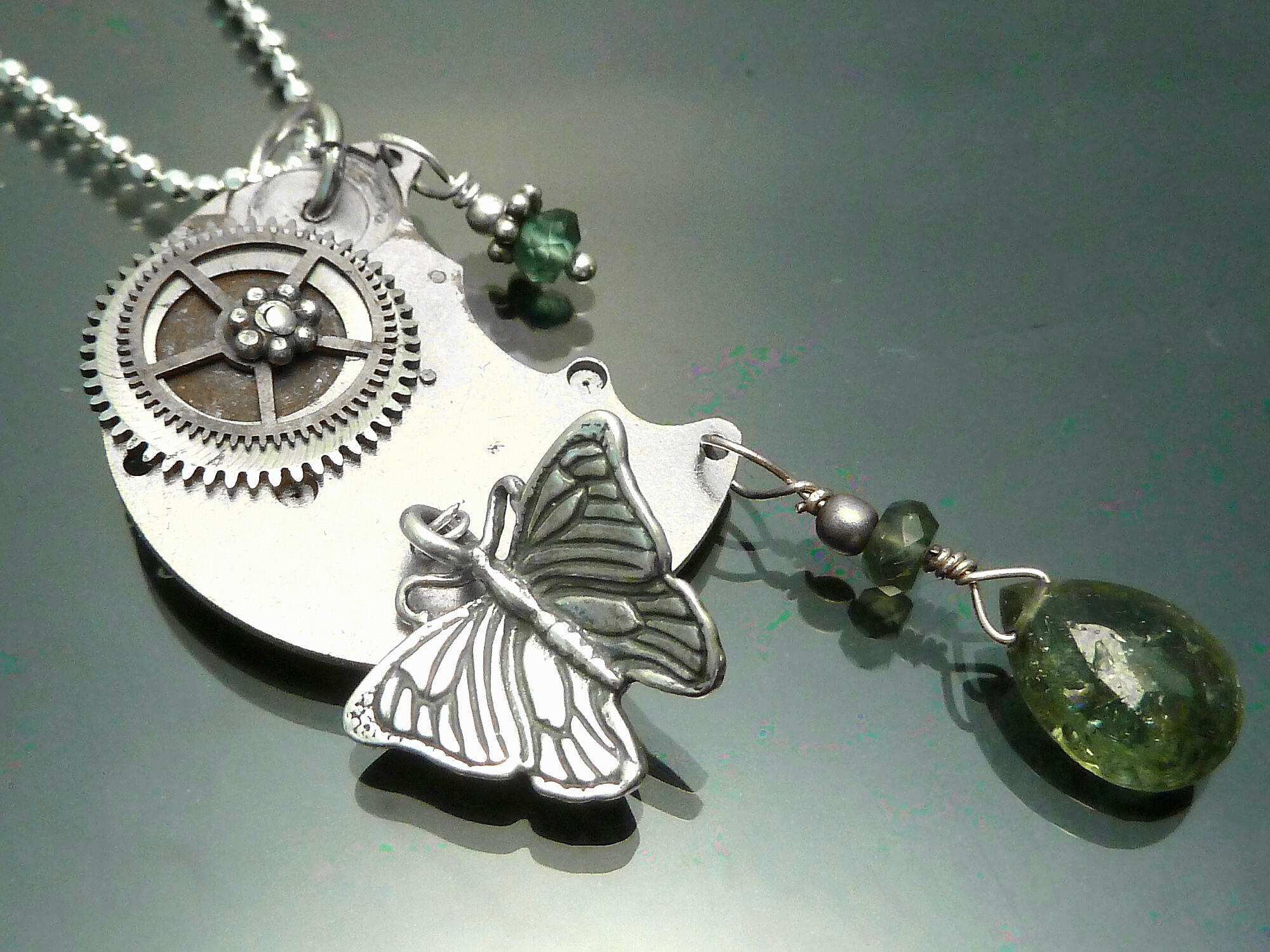 Moon & Butterfly Necklace in Sterling Silver with watch parts and Green Tourmaline