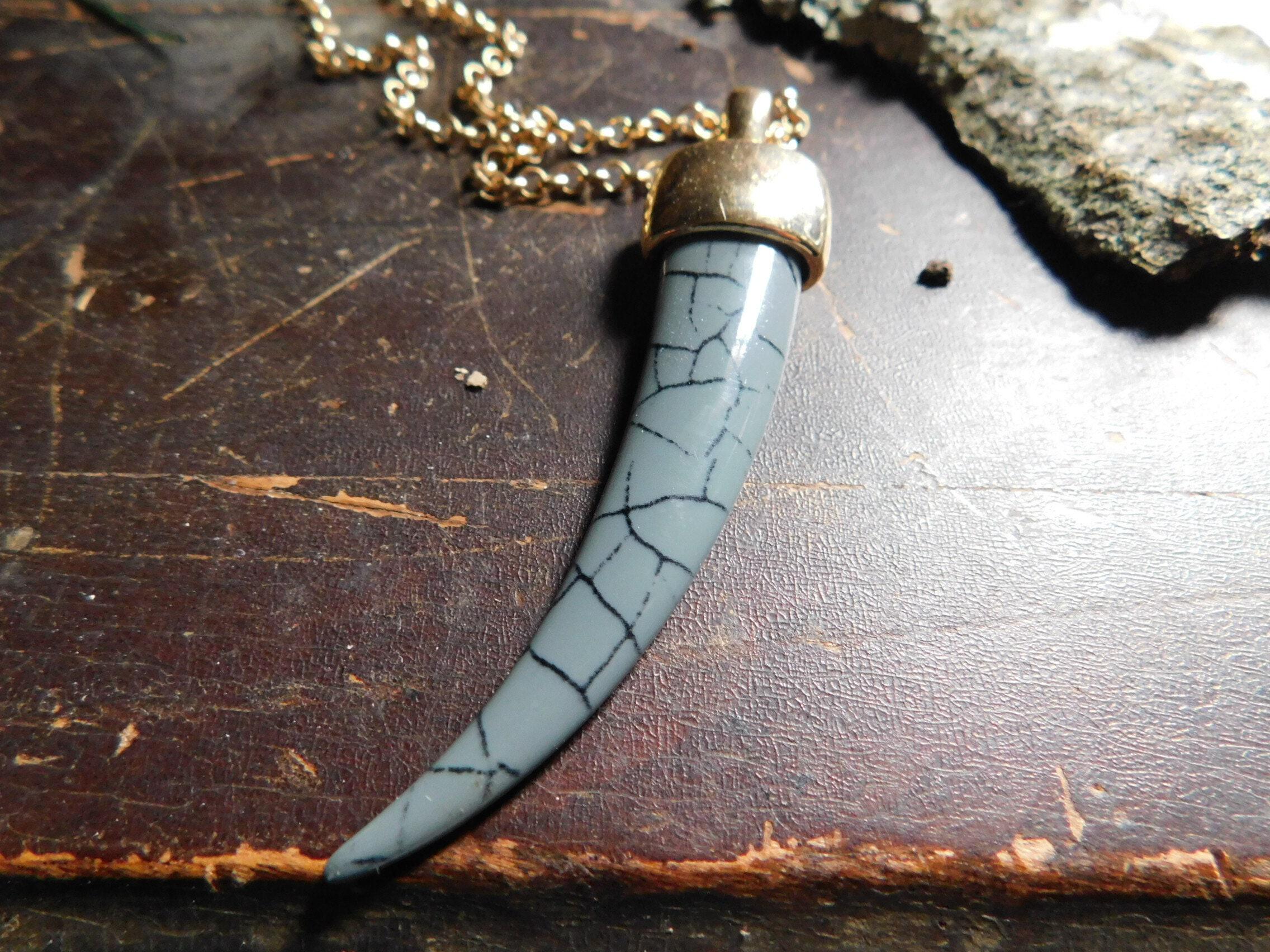 Jewelry :: Necklaces :: Tusk. Gray Acrylic Tusk Horn Necklace. Gold capped  tusk pendant necklace