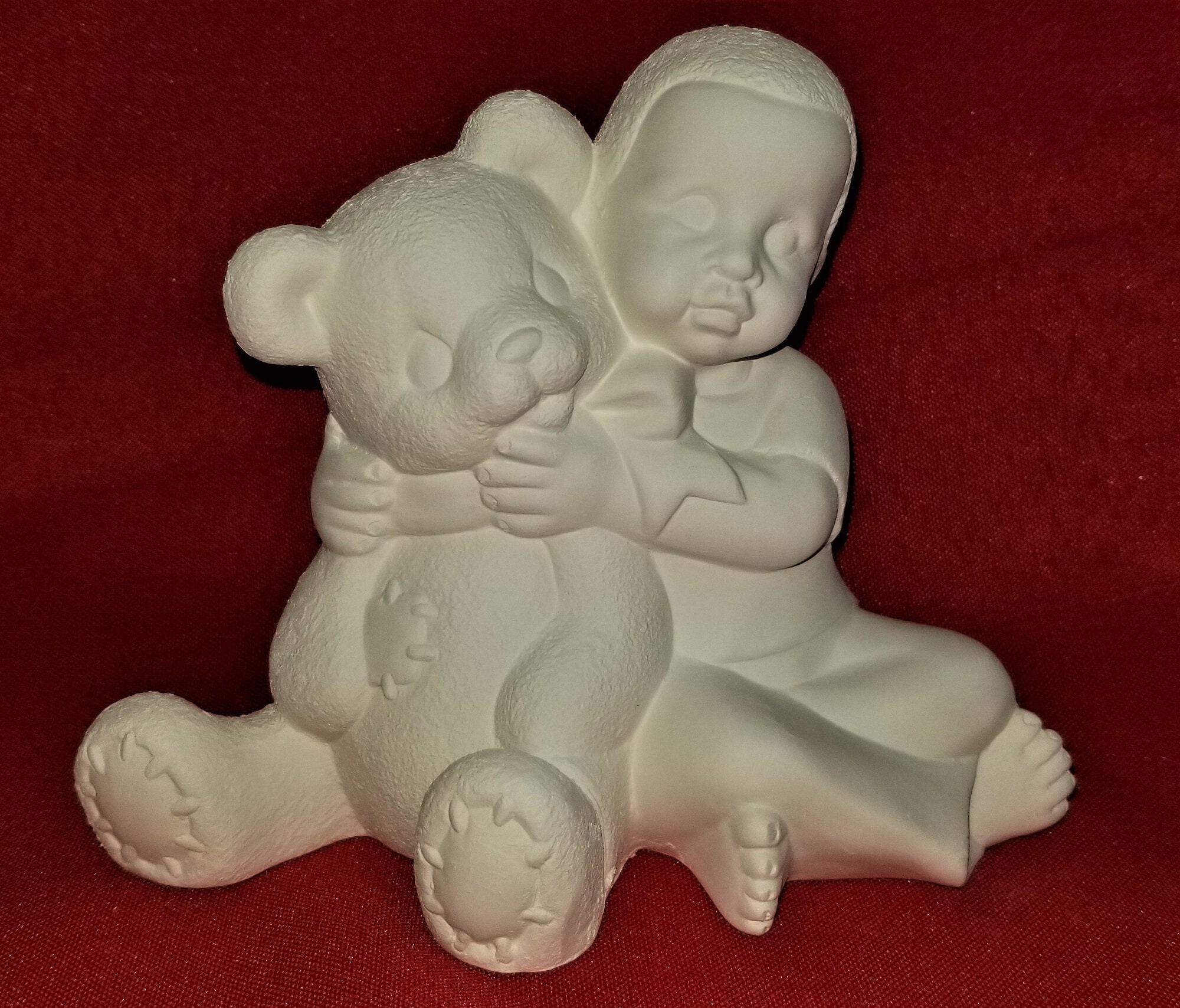 soap carvings of boy and girl