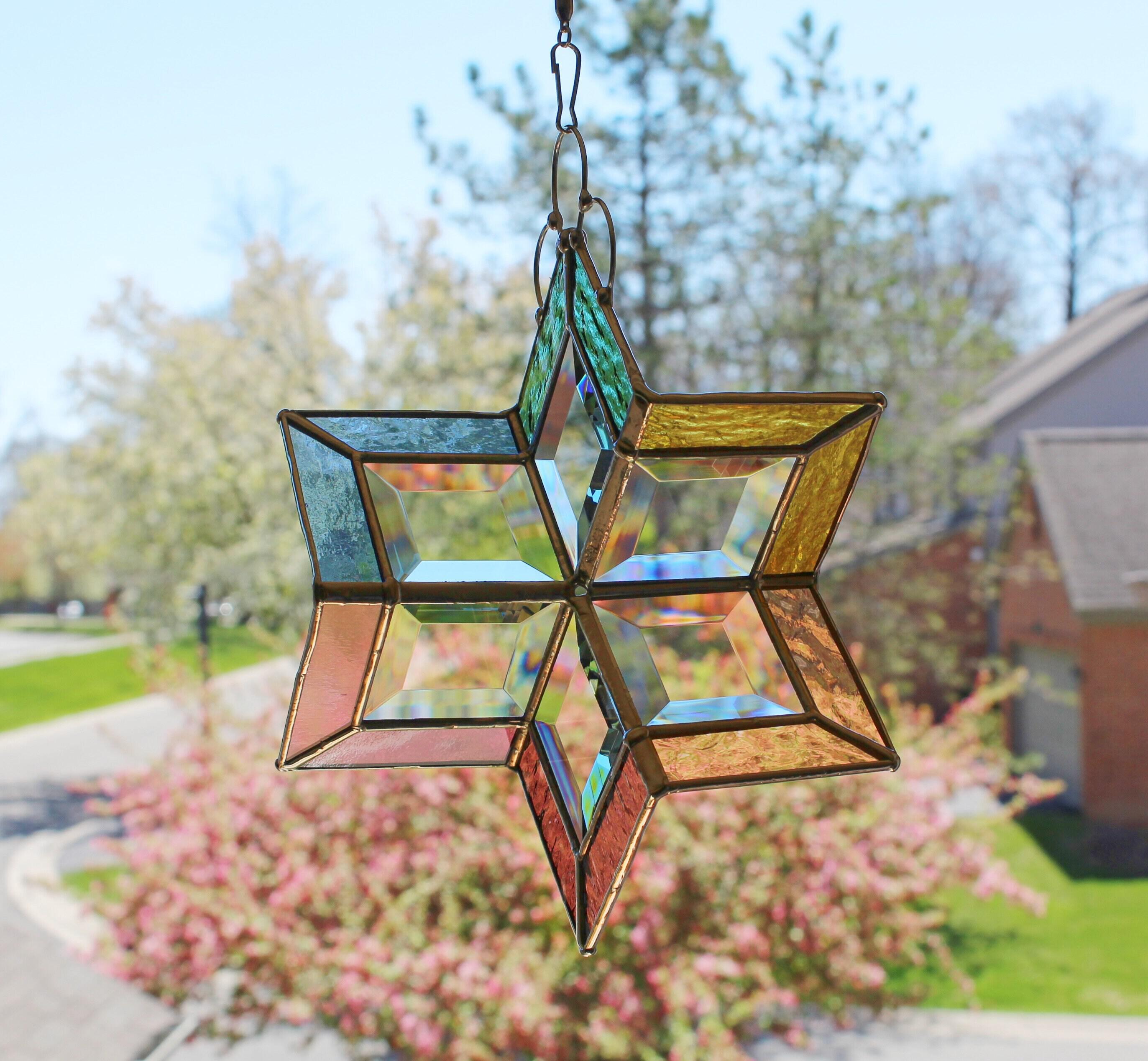 Products :: 3D stained glass spinner. Twirling rainbow colors with bevels.  Hanging beveled prism sun catcher for inside outside. Expertly handcrafted  home decor