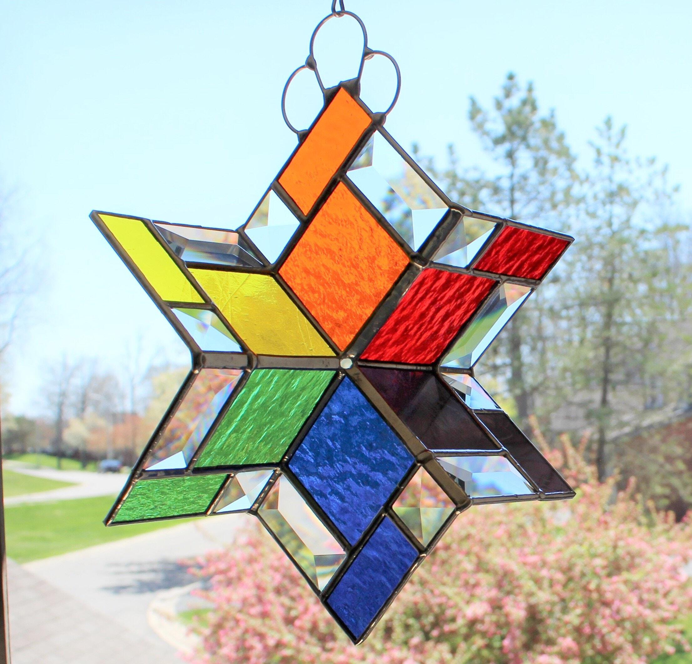 Products :: 3D stained glass spinner. Twirling rainbow colors with bevels.  Hanging beveled prism sun catcher for inside outside. Expertly handcrafted  home decor