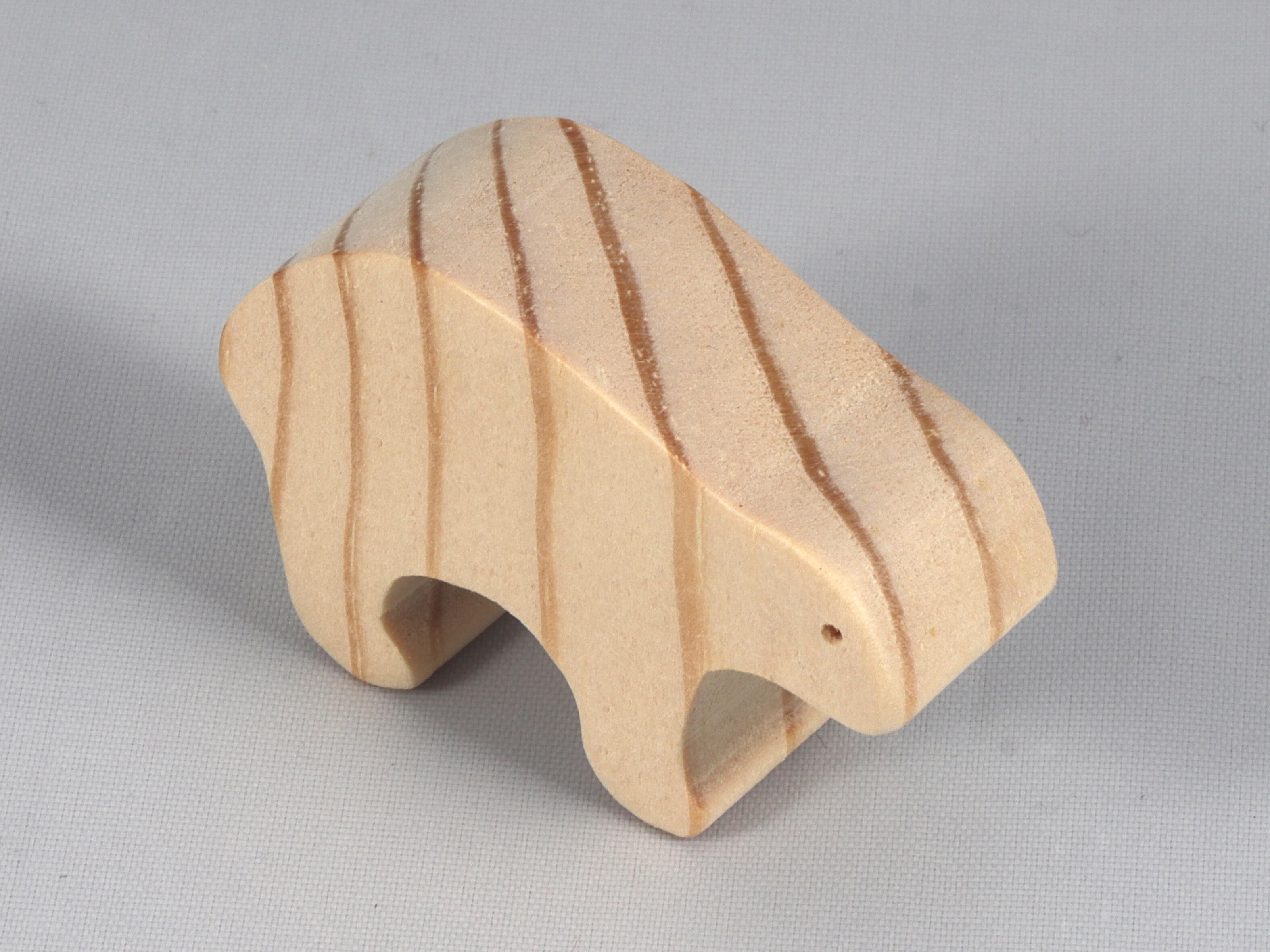 This wooden toy bear is a part of my Itty Bitty Animals Collection and has been handmade in America. It is unfinished, freestanding, and can be stacked. The toy is made using traditional woodworking tools, sanded smooth, and is ready to be painted.