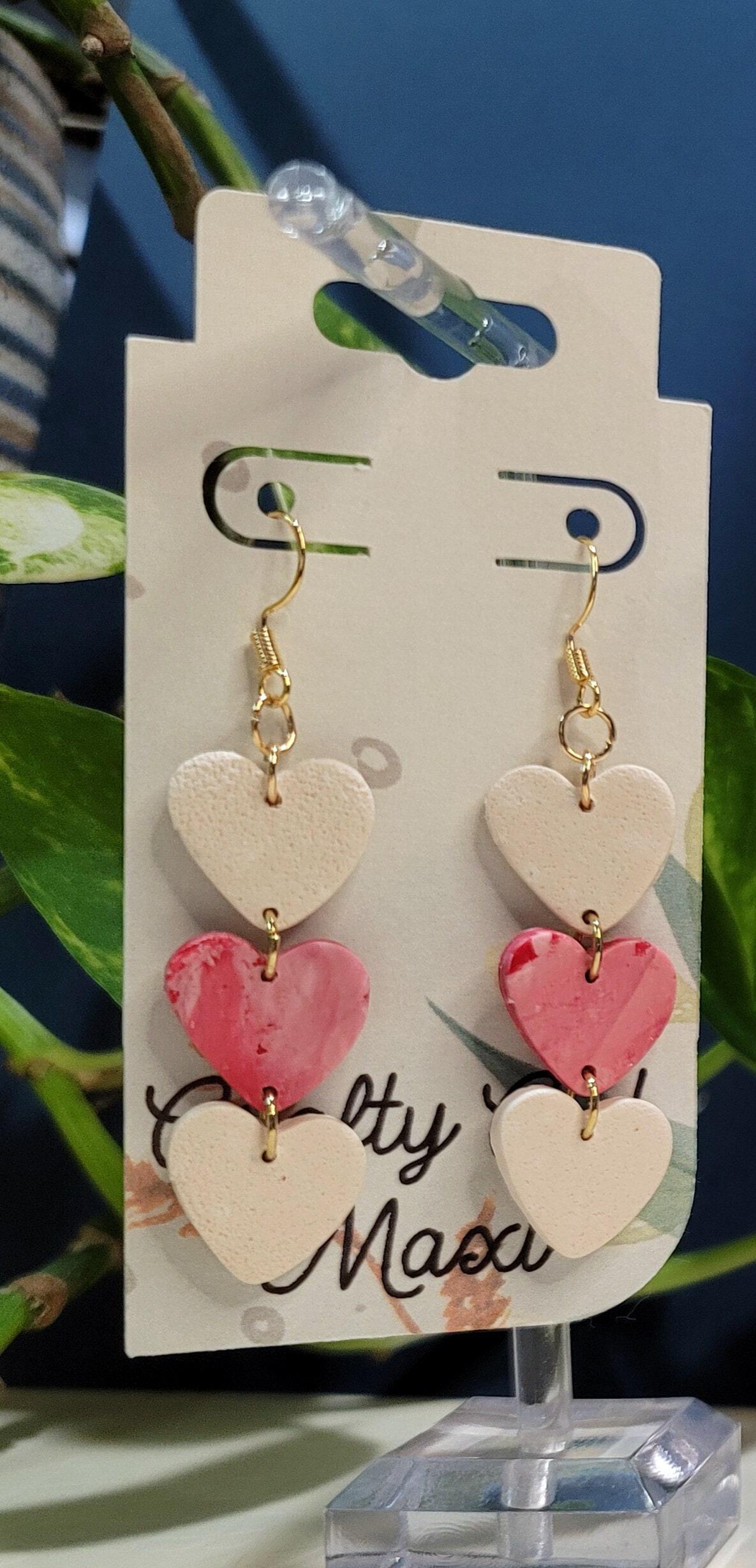 Heart polymer clay earrings. Lightweight earrings. Made in a modern clay  earring designs. Hoops,accent beads, and hearts make a great gift.