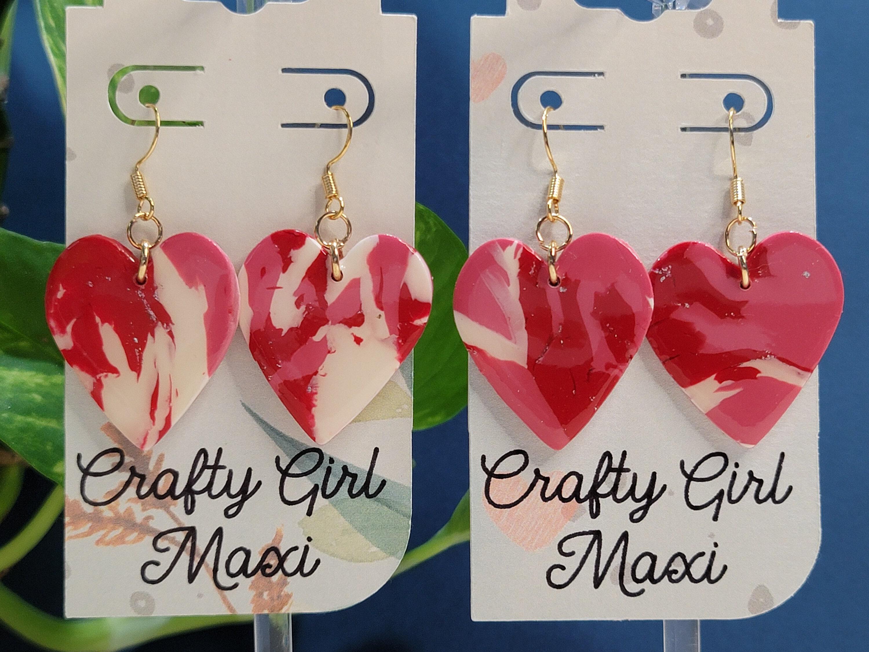Heart polymer clay earrings. Lightweight earrings. Made in a modern clay  earring designs. Hoops,accent beads, and hearts make a great gift.