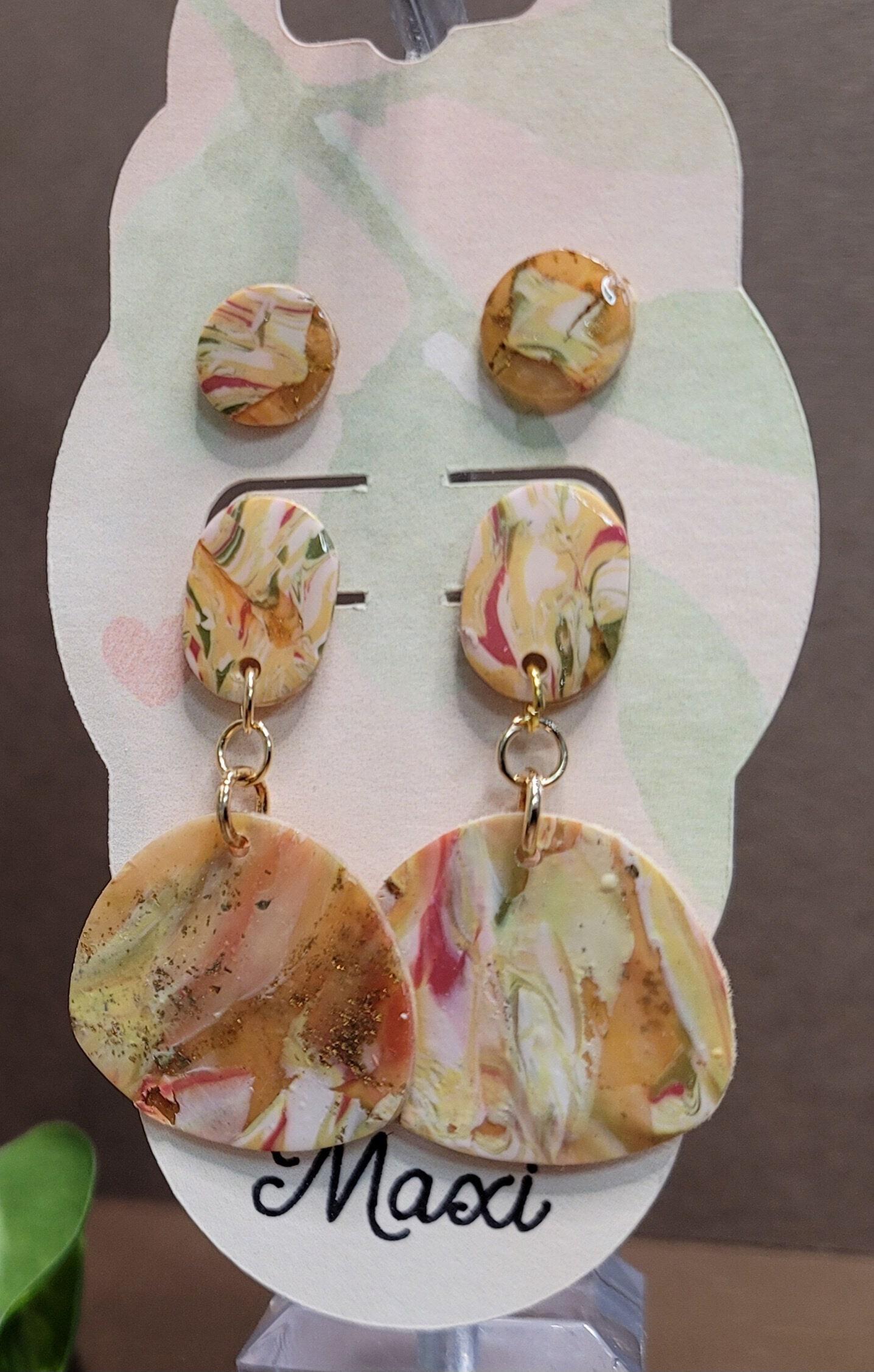 Delicate clay earrings in a translucent marble polymer clay. These