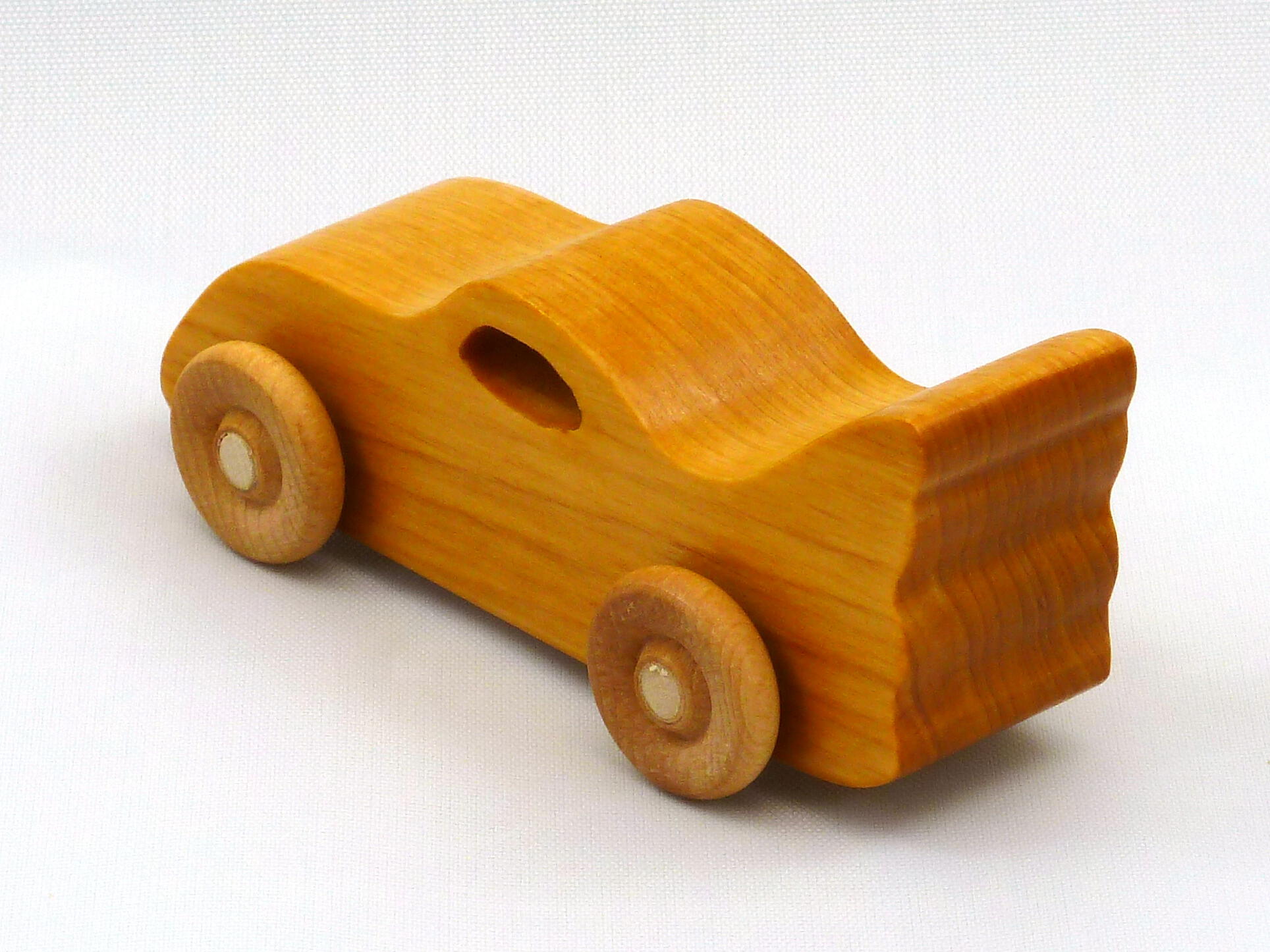 Handmade wooden toy bat car handcrafted and finished with amber shellac. This car is a part of my Play Pal Collection.