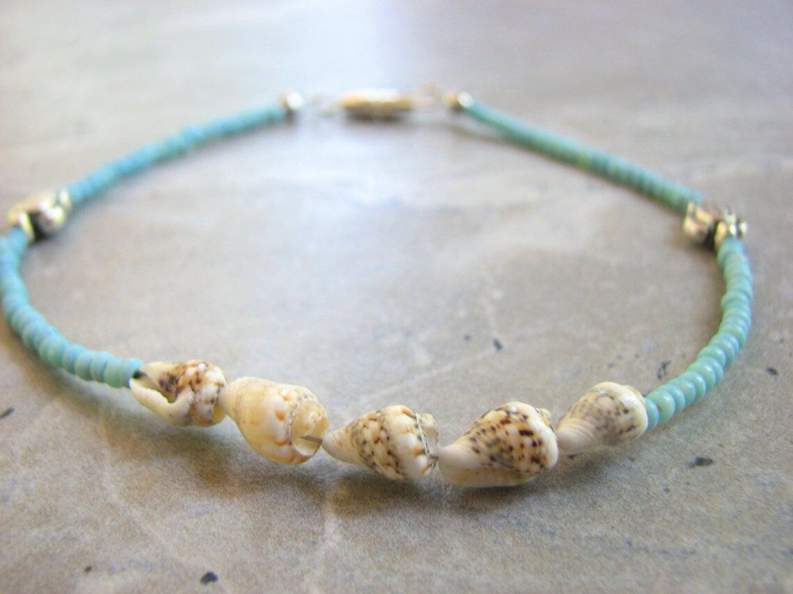 Natural shells recycled from vintage Hawaiian Leis