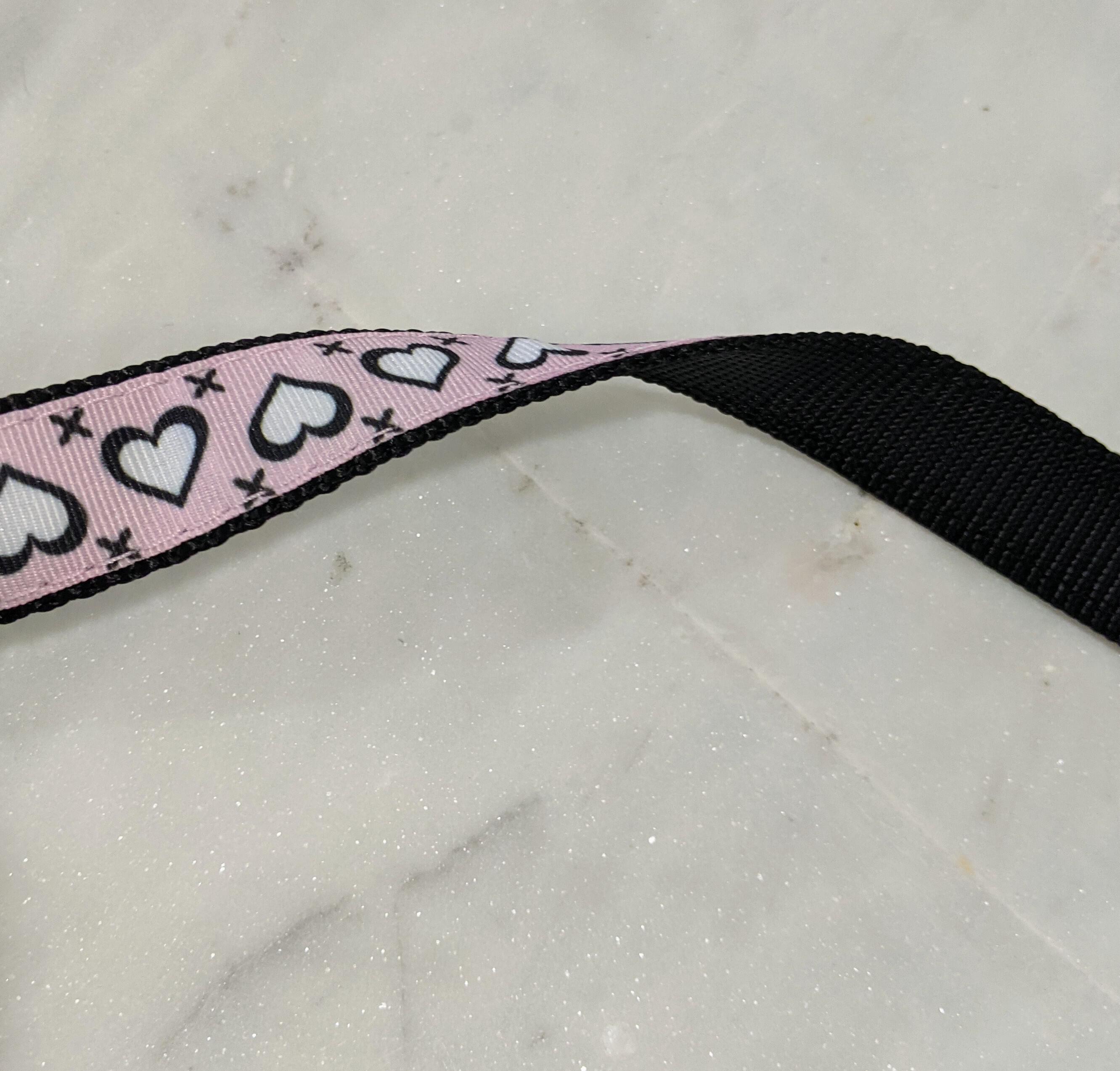 1 inch wide pink and black dog leash with hearts