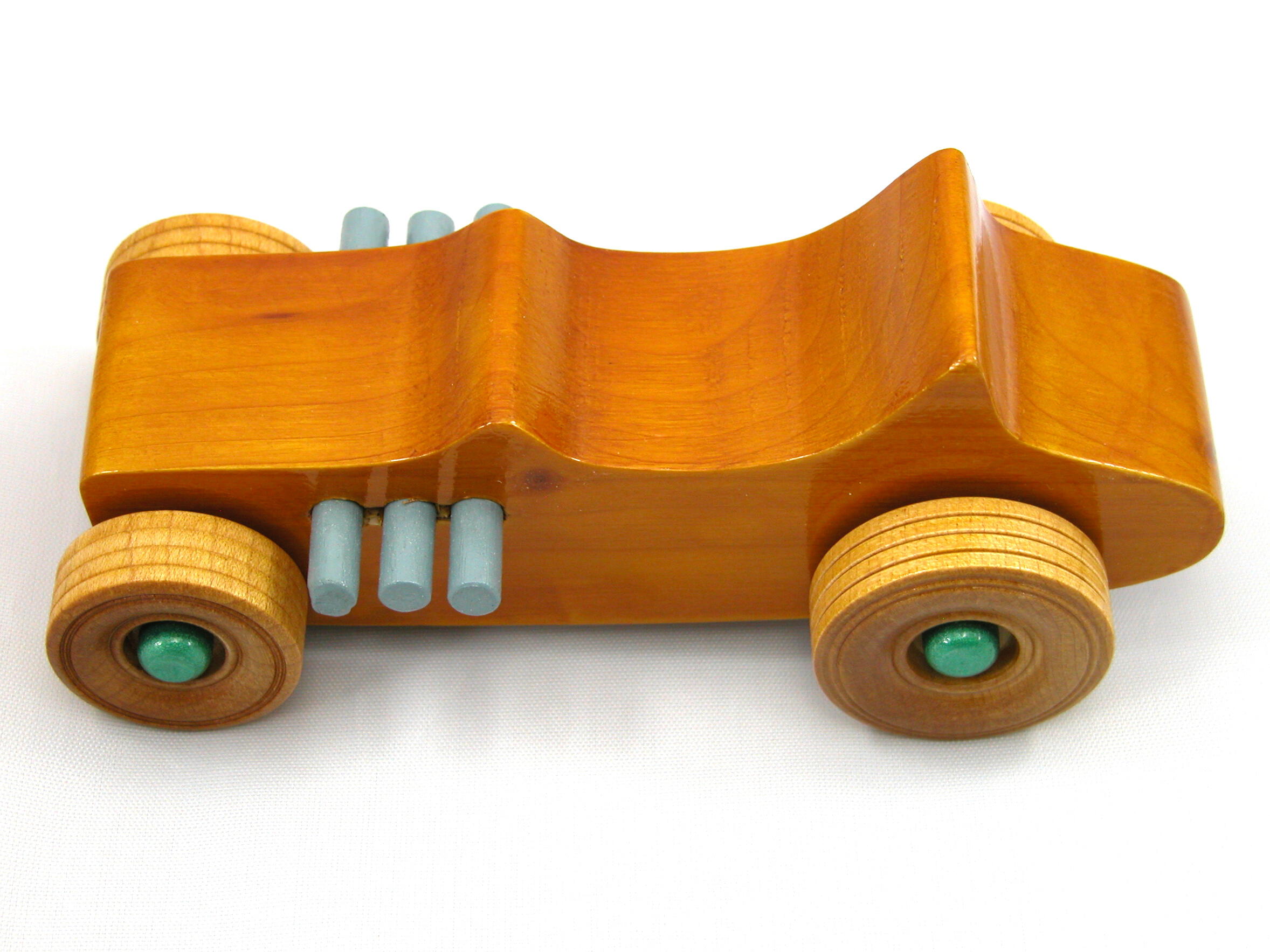 Handmade wood toy car Hot Rod 1927 T-Bucket and hand finished with amber shellac with grey and metallic emerald green.