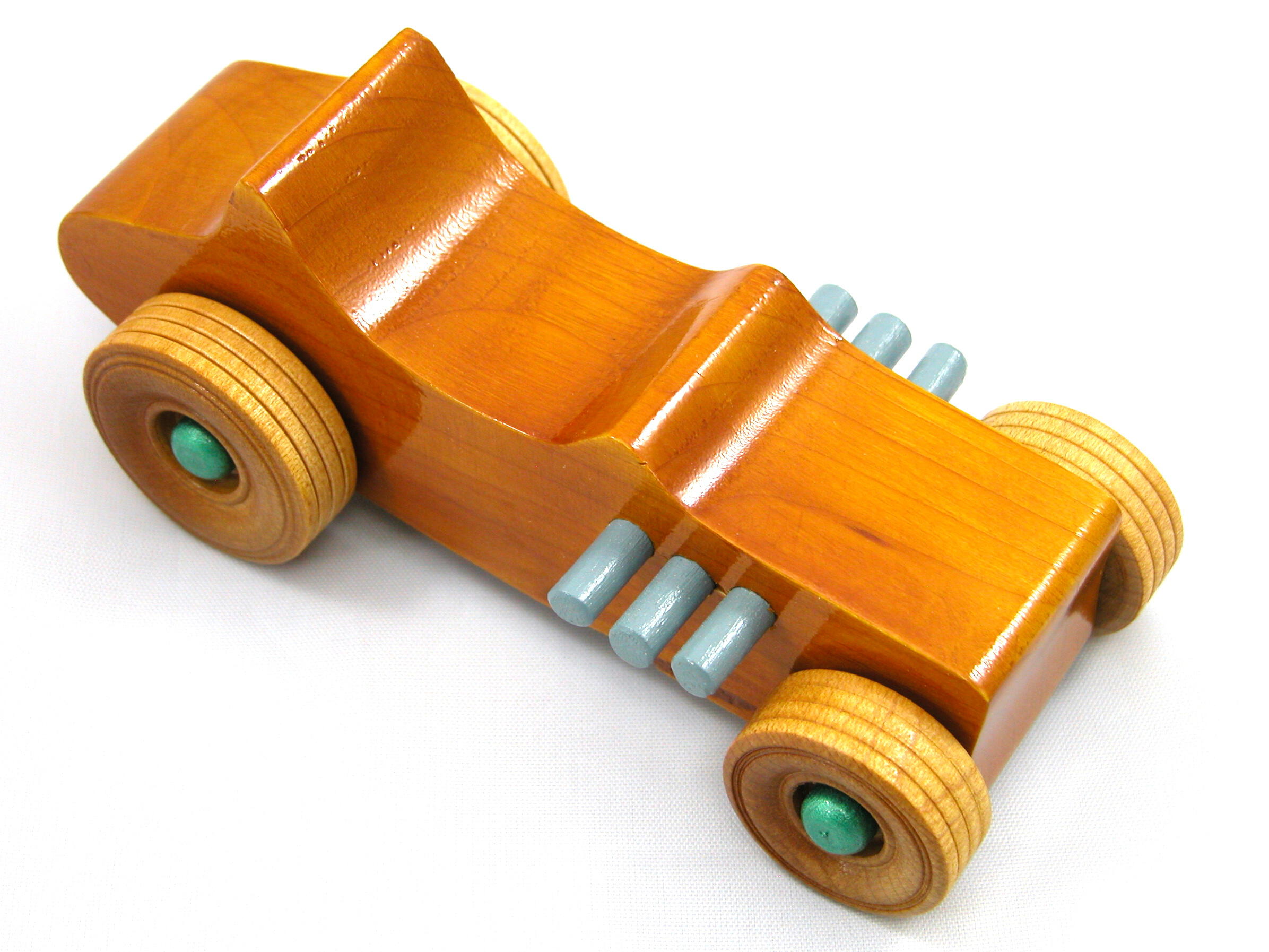 Handmade wood toy car Hot Rod 1927 T-Bucket and hand finished with amber shellac with grey and metallic emerald green.