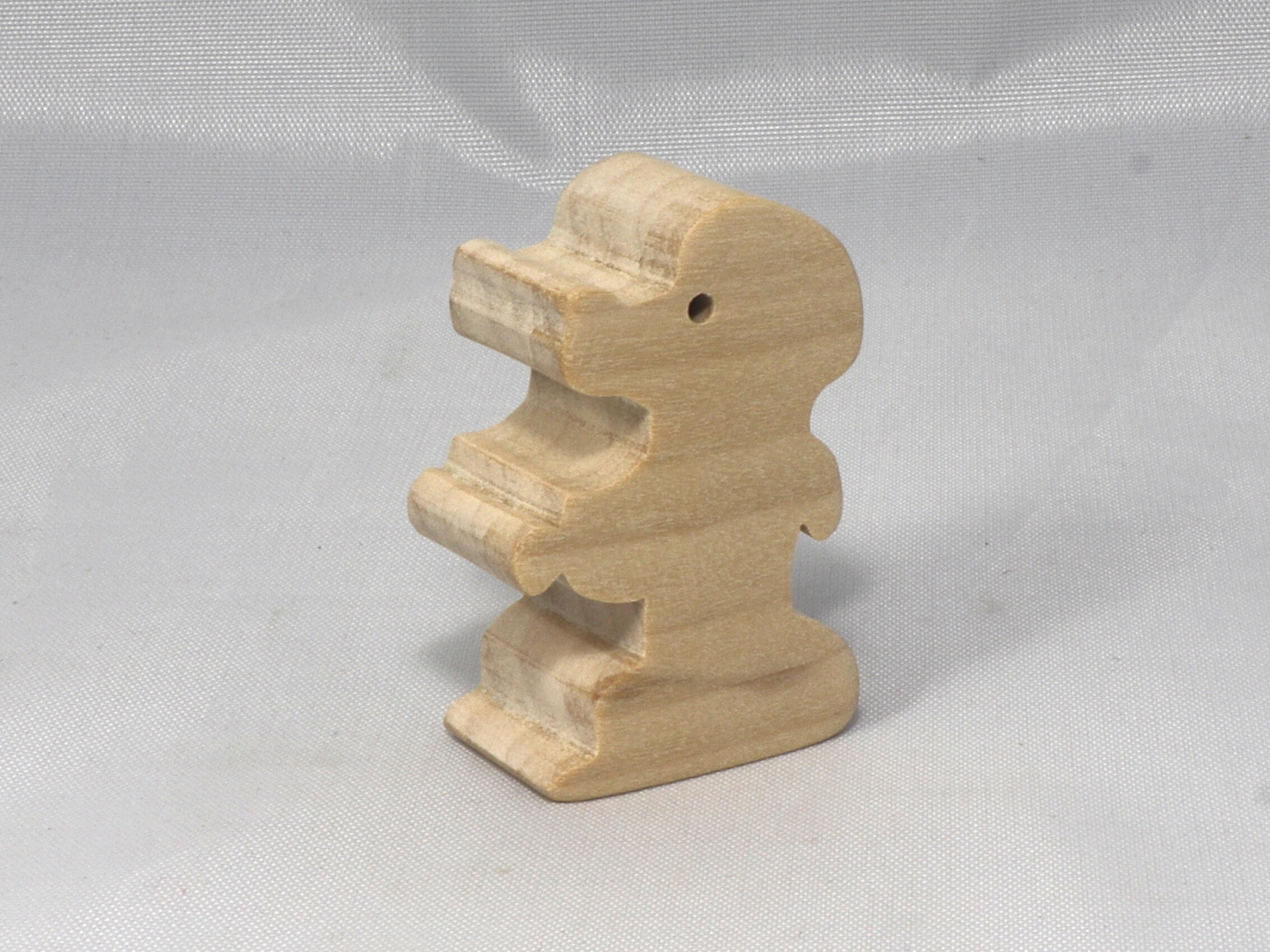 Handmade wood poodle puppy cutout made from unfinished wood. It is sanded and ready to paint. It is freestanding and an excellent pretend toy that can also be used for crafts.