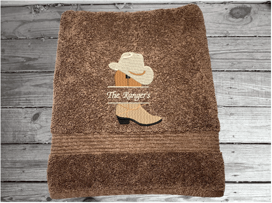 https://d1q8o8ch5u48ua.cloudfront.net/images/detailed/2221/Western-bath-towels-decroative-towels-embroidered-cowboy-decor-personalized-towel-name-Borgmanns-Creations-2.PNG?t=1698226164
