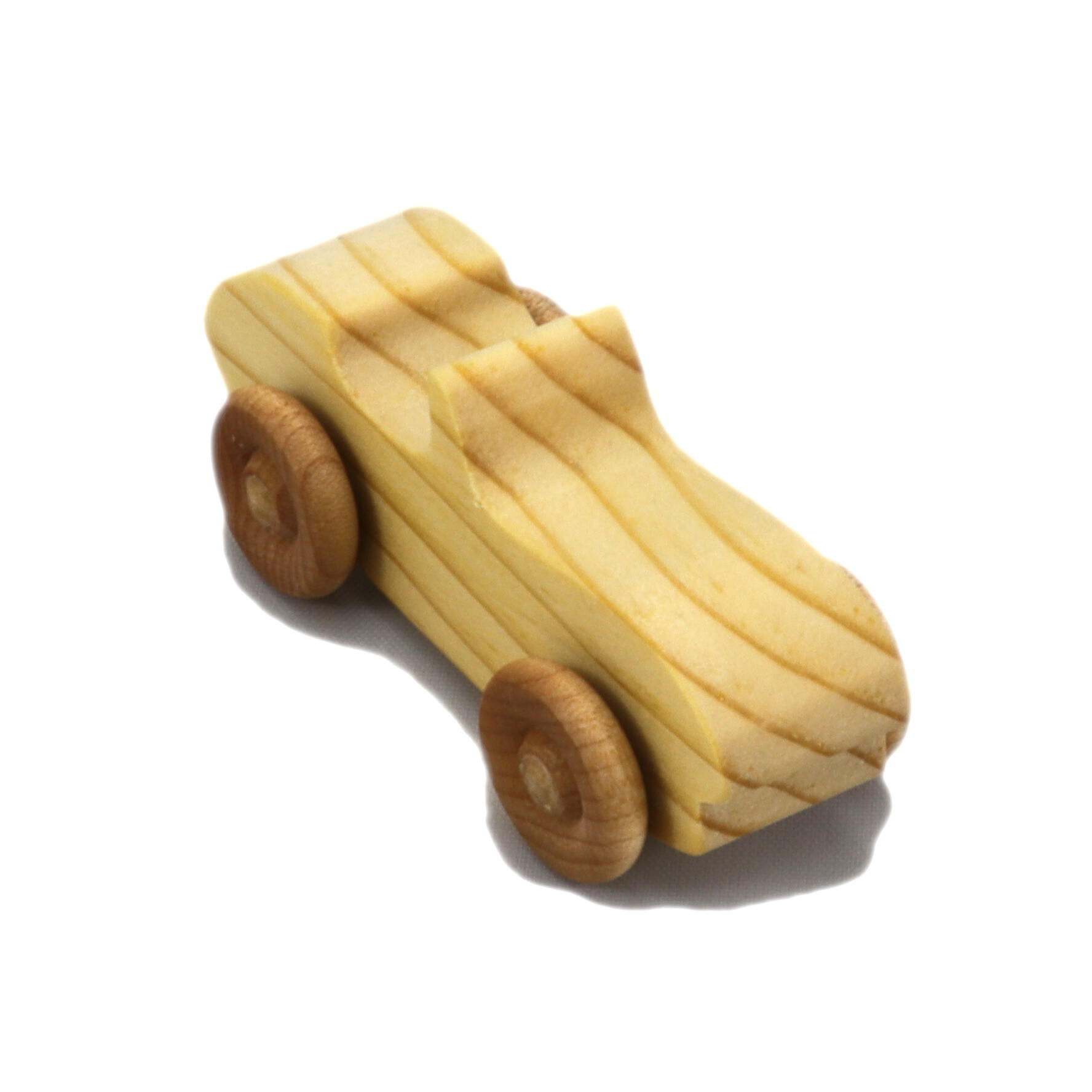 A small handmade wooden toy car hand-finished with a custom blend of mineral oil and waxes.