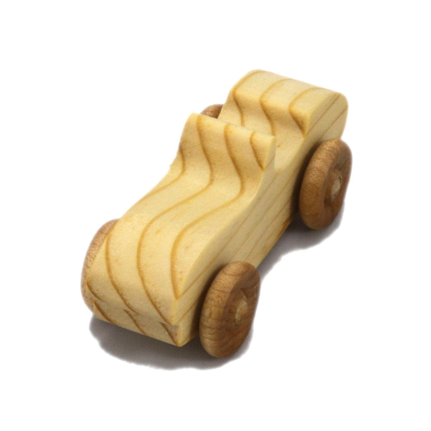 A small handmade wooden toy car hand-finished with a custom blend of mineral oil and waxes.
