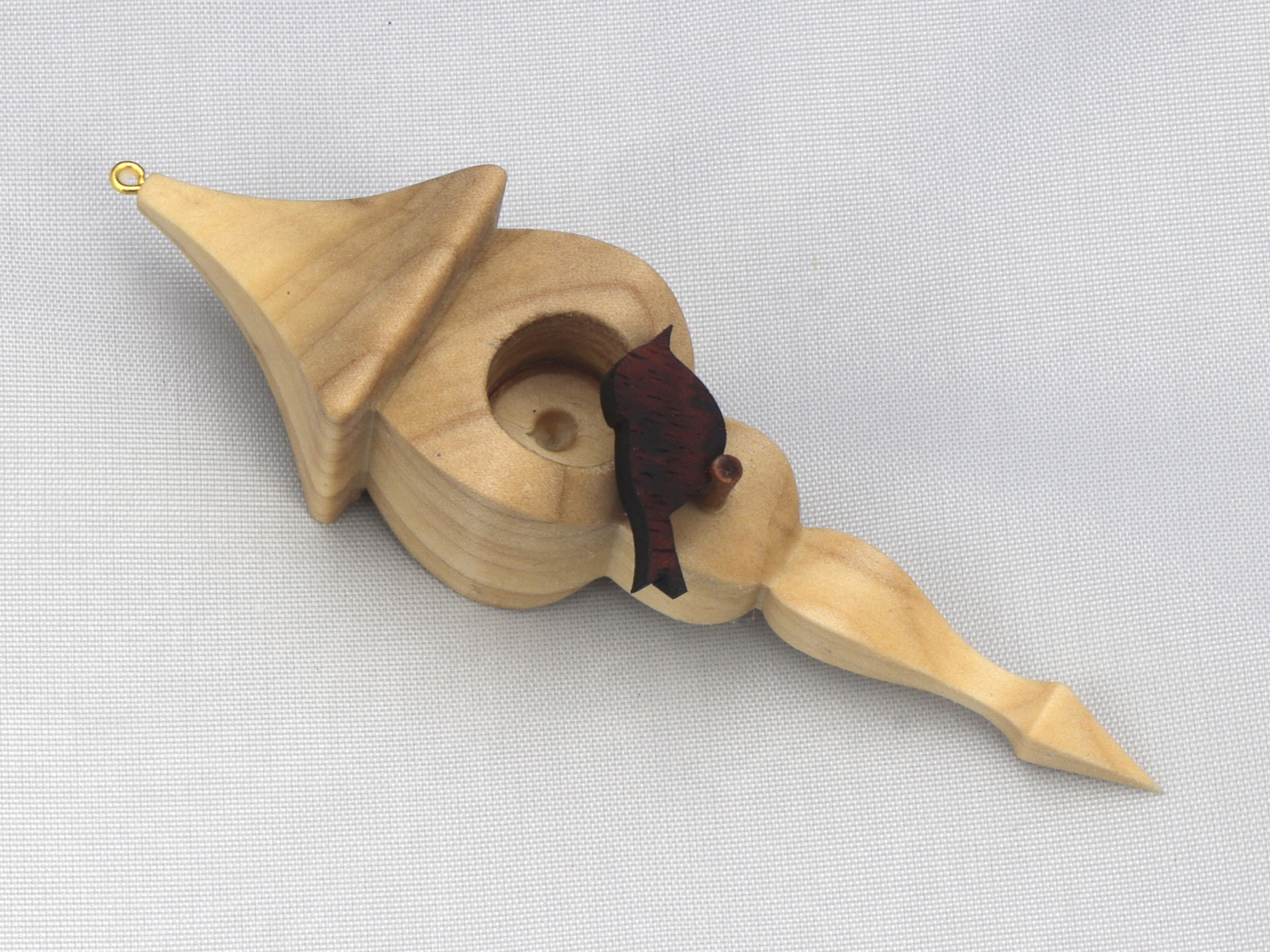 Handmade mini birdhouse Christmas tree ornament crafted from hand-selected hardwoods using traditional woodworking tools, and hand-finished with a blend of custom-made waxes and oils. A unique and collectible addition to your holiday decor or a thoughtful gift.