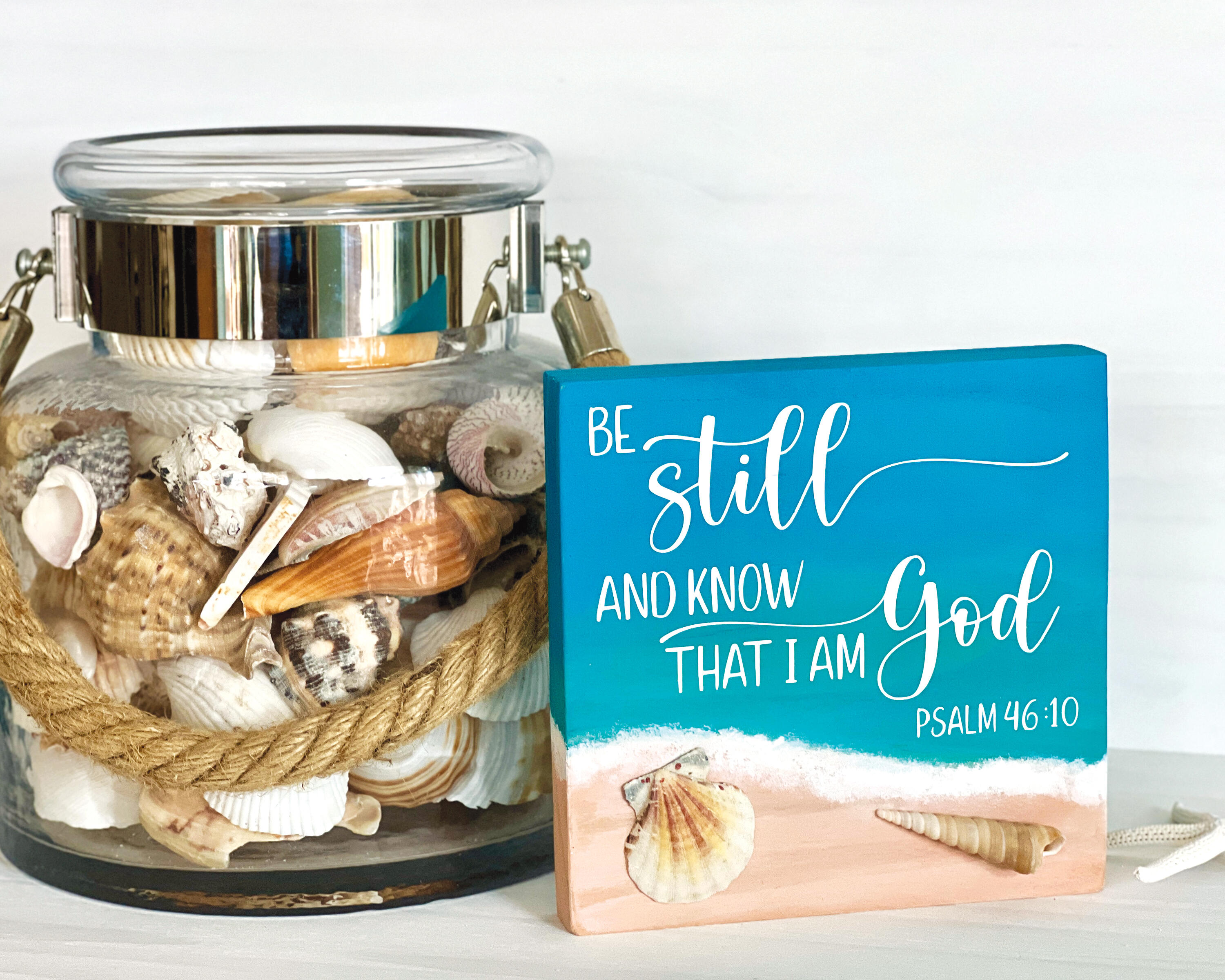 Be Still and Know that I am God, Psalm 46:10 Sign with real shells and a watercolor type background