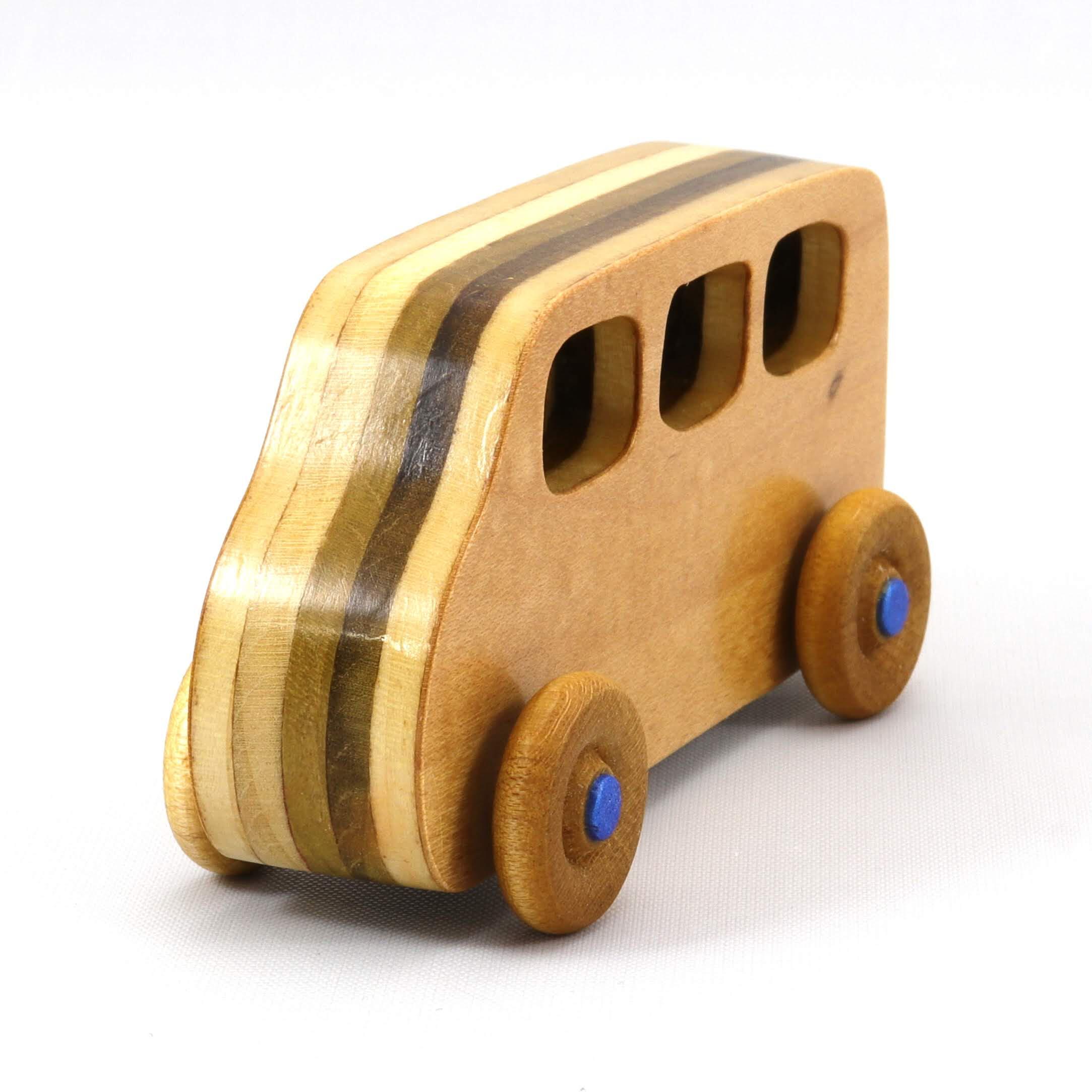 Handmade wood toy minivan made by me in my shop using traditional woodworking tools. It is hand finished with clear shellac with metallic sapphire blue acrylic paint.