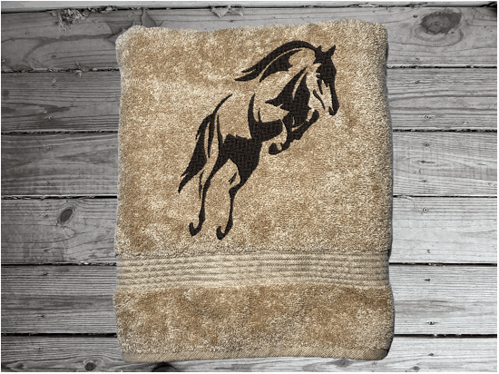 https://d1q8o8ch5u48ua.cloudfront.net/images/detailed/2282/Horse-embroidered-bath-towel-set-western-horse-design-personalized-bathroom-decor-Borgmanns-Creations-3.PNG?t=1698761344