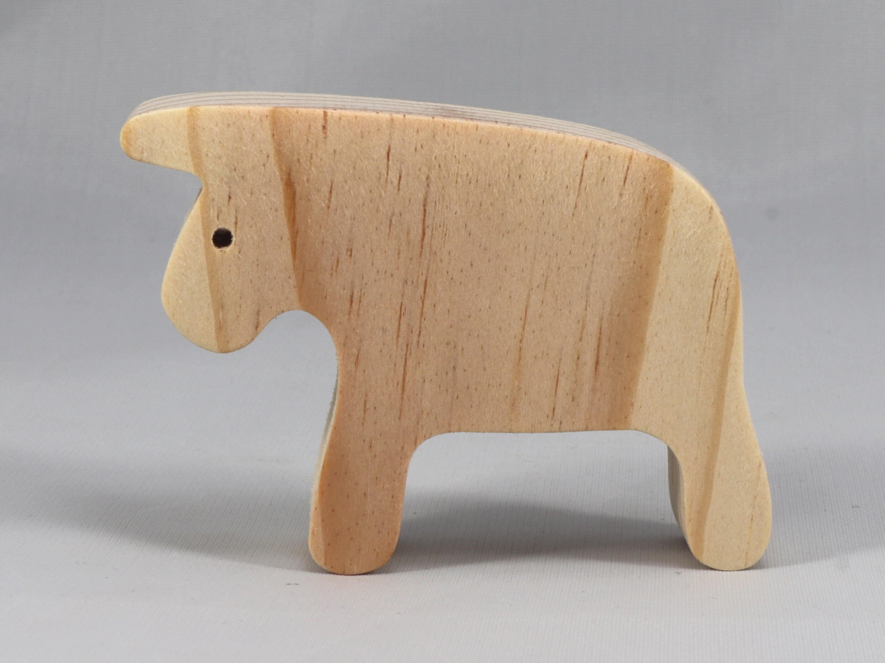 Handmade wooden bull toy cutout unpainted and ready to paint. It is free standing and stackable. From my Itty Bitty Animal Collection.