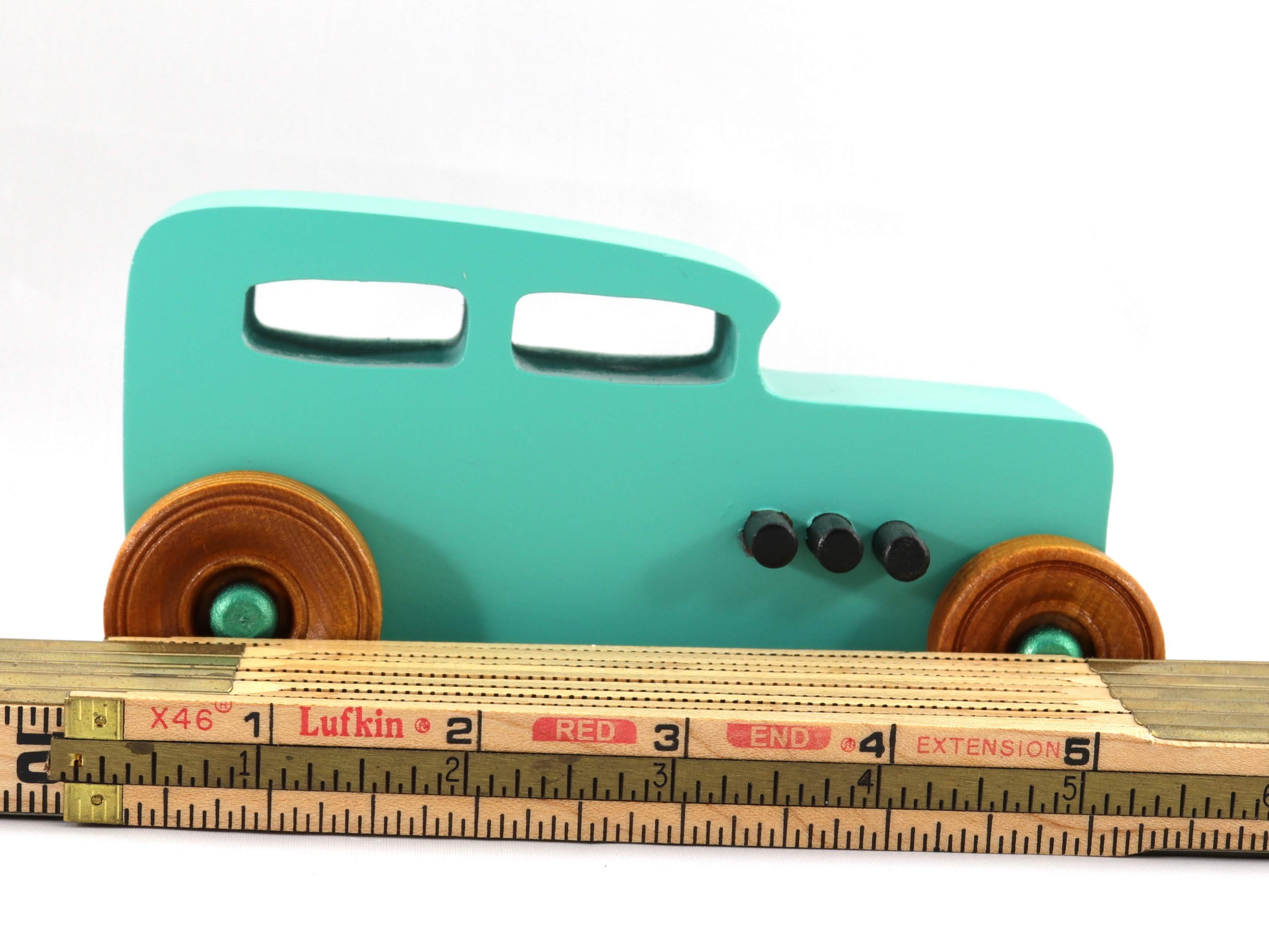 Handmade Wood Toy Car Hot Rod 1932 Sedan Painted With Turquoise, Metallic Emerald Green, and Black Acrylic Paint. The Wheels Are Finished with Nonmarring Amber Shellac.