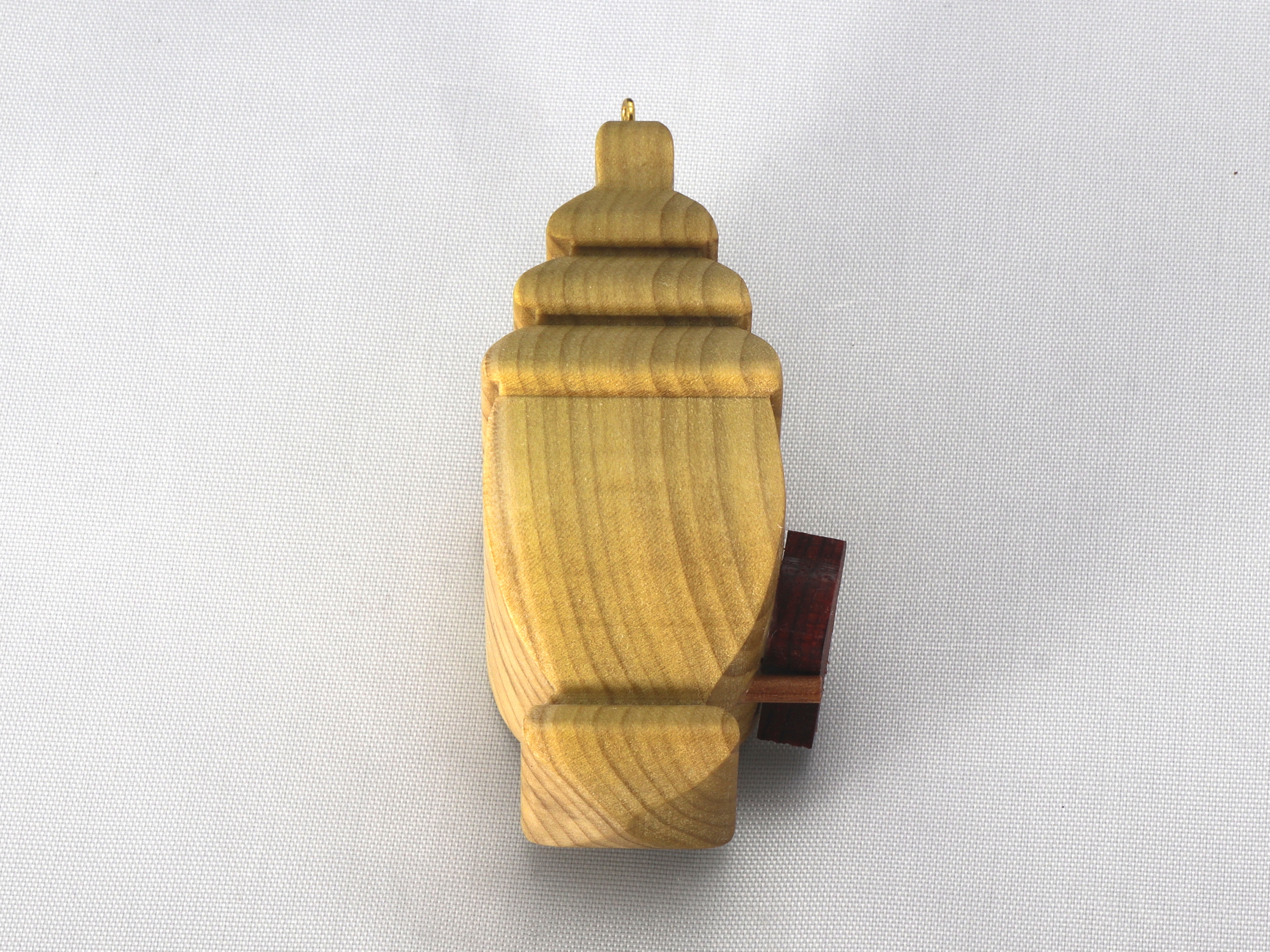 Handmade Wood Birdhouse Ornament Collectable Christmas Tree Ornament shapeed like a Christmas tree. Made from select-grade hardwoods, hand-sanded, and finished with a custom blend of oils and waxes using traditional woodworking tools.