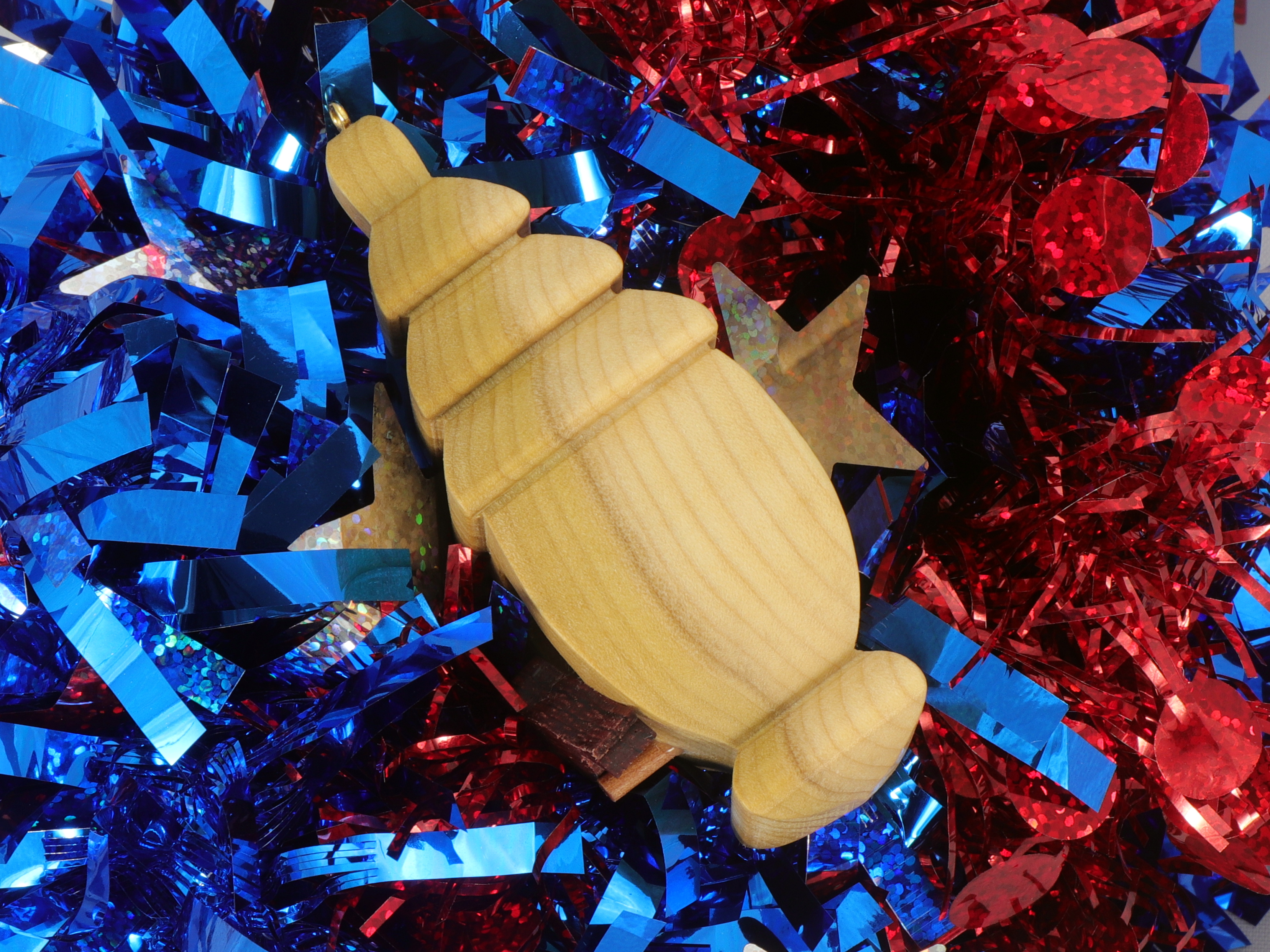 Handmade Wood Birdhouse Ornament Collectable Christmas Tree Ornament shapeed like a Christmas tree. Made from select-grade hardwoods, hand-sanded, and finished with a custom blend of oils and waxes using traditional woodworking tools.
