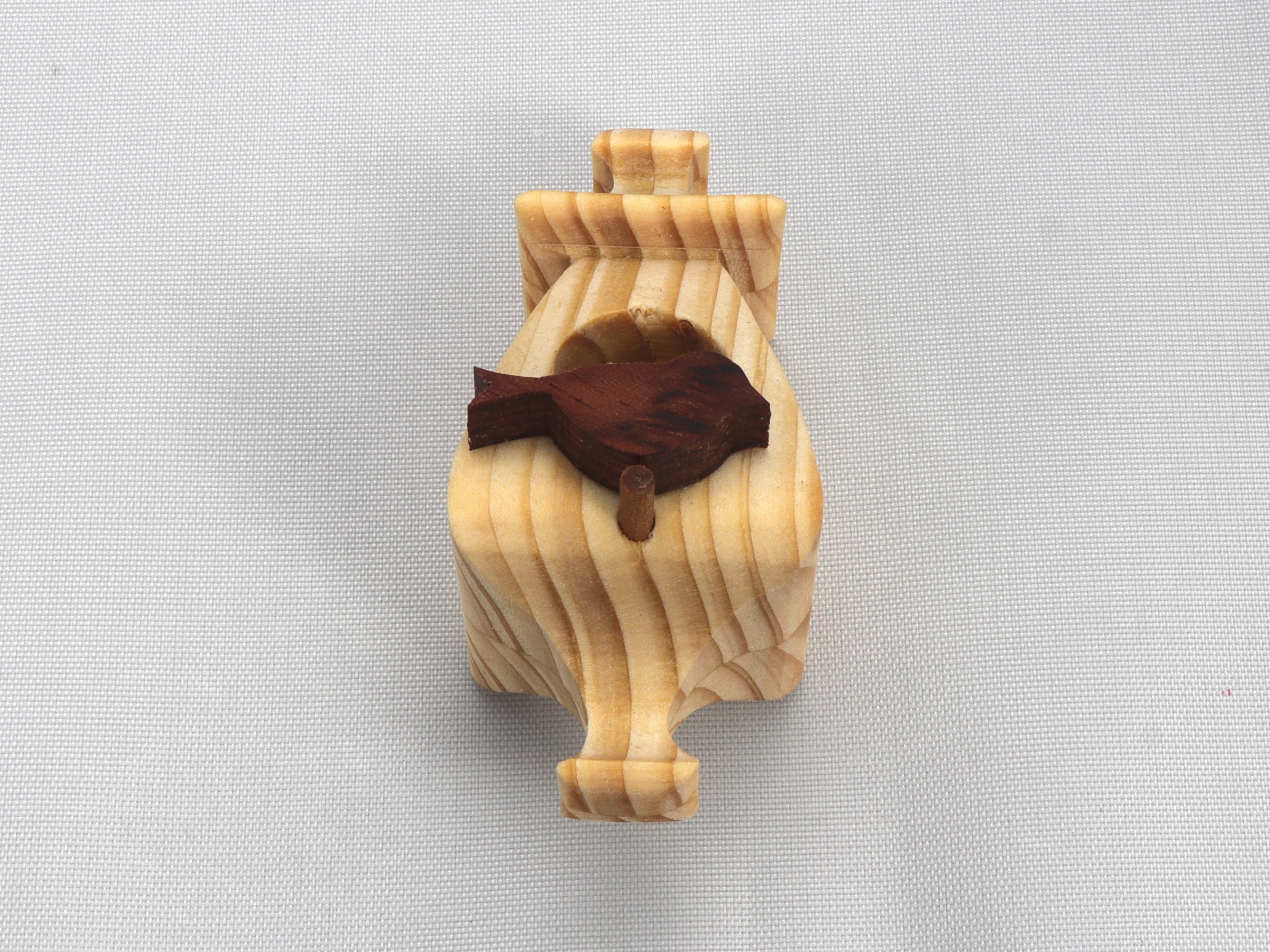 Handmade Wood Miniature Birdhouse Ornament crafted using only the finest select hardwoods and traditional woodworking tools. Each ornament is individually finished with a blend of mineral oil and beeswax to bring out the natural beauty of the wood.