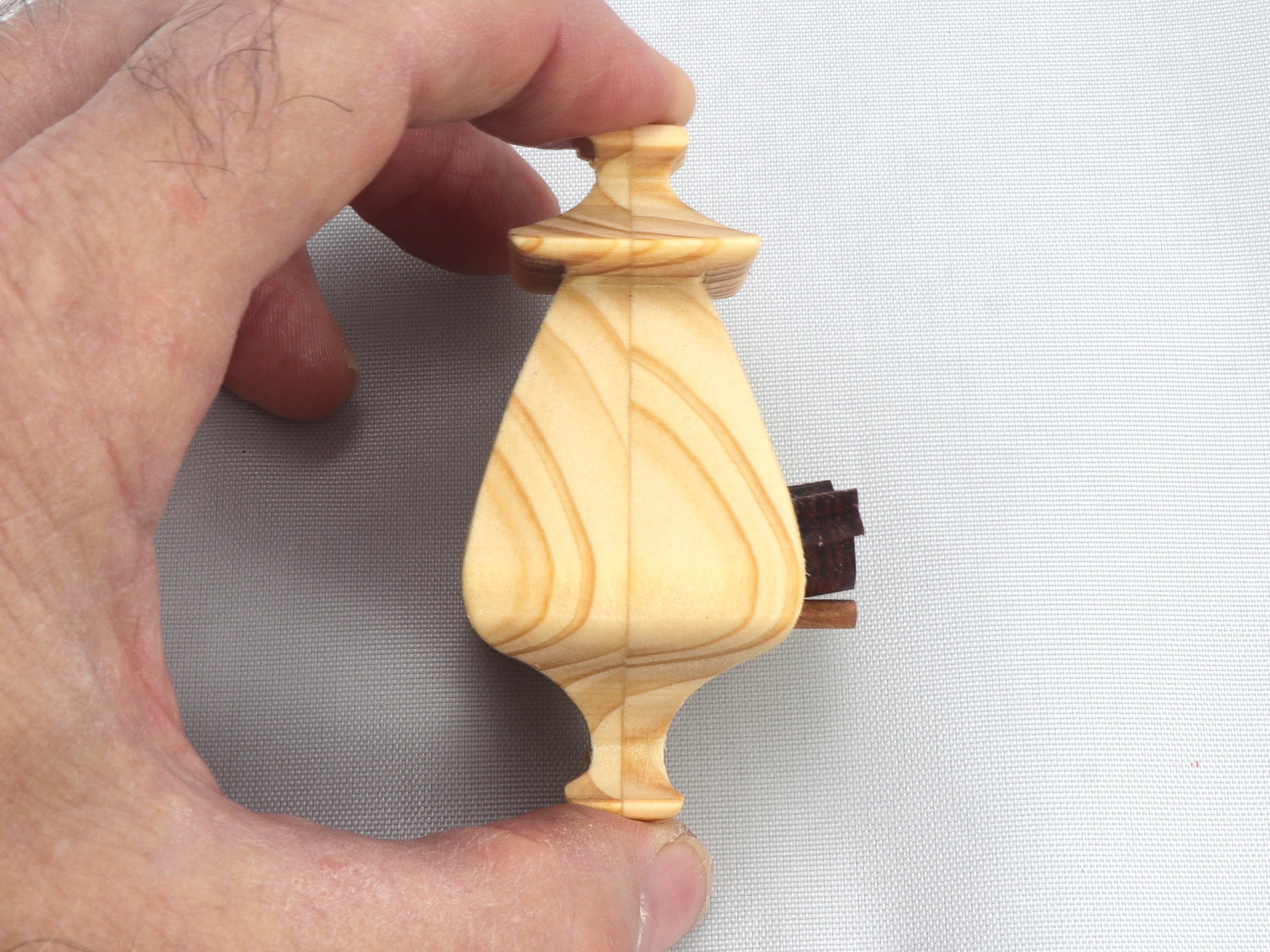 Handmade Wood Miniature Birdhouse Ornament crafted using only the finest select hardwoods and traditional woodworking tools. Each ornament is individually finished with a blend of mineral oil and beeswax to bring out the natural beauty of the wood.