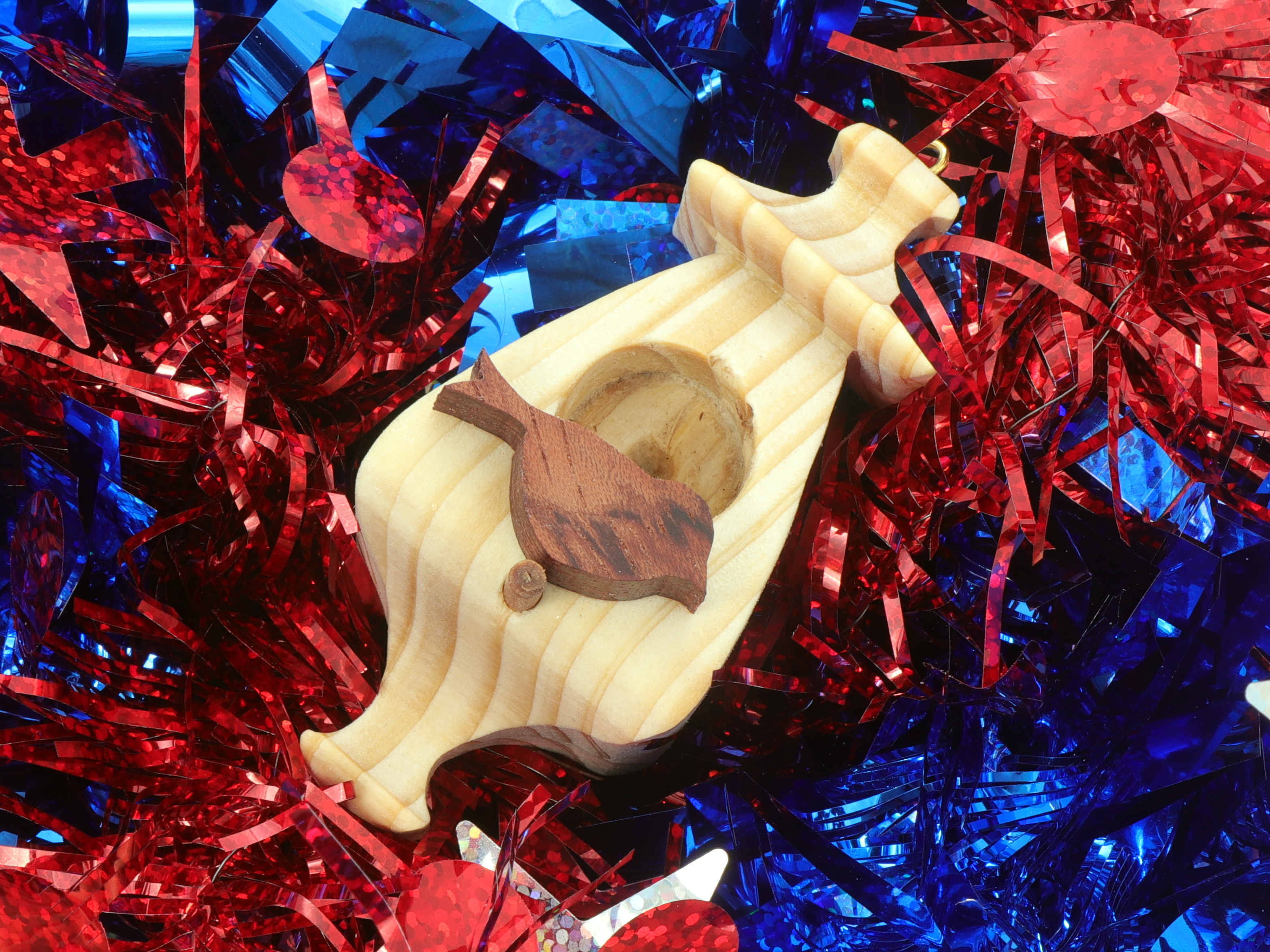 Handmade Wood Miniature Birdhouse Ornament crafted using only the finest select hardwoods and traditional woodworking tools. Each ornament is individually finished with a blend of mineral oil and beeswax to bring out the natural beauty of the wood.