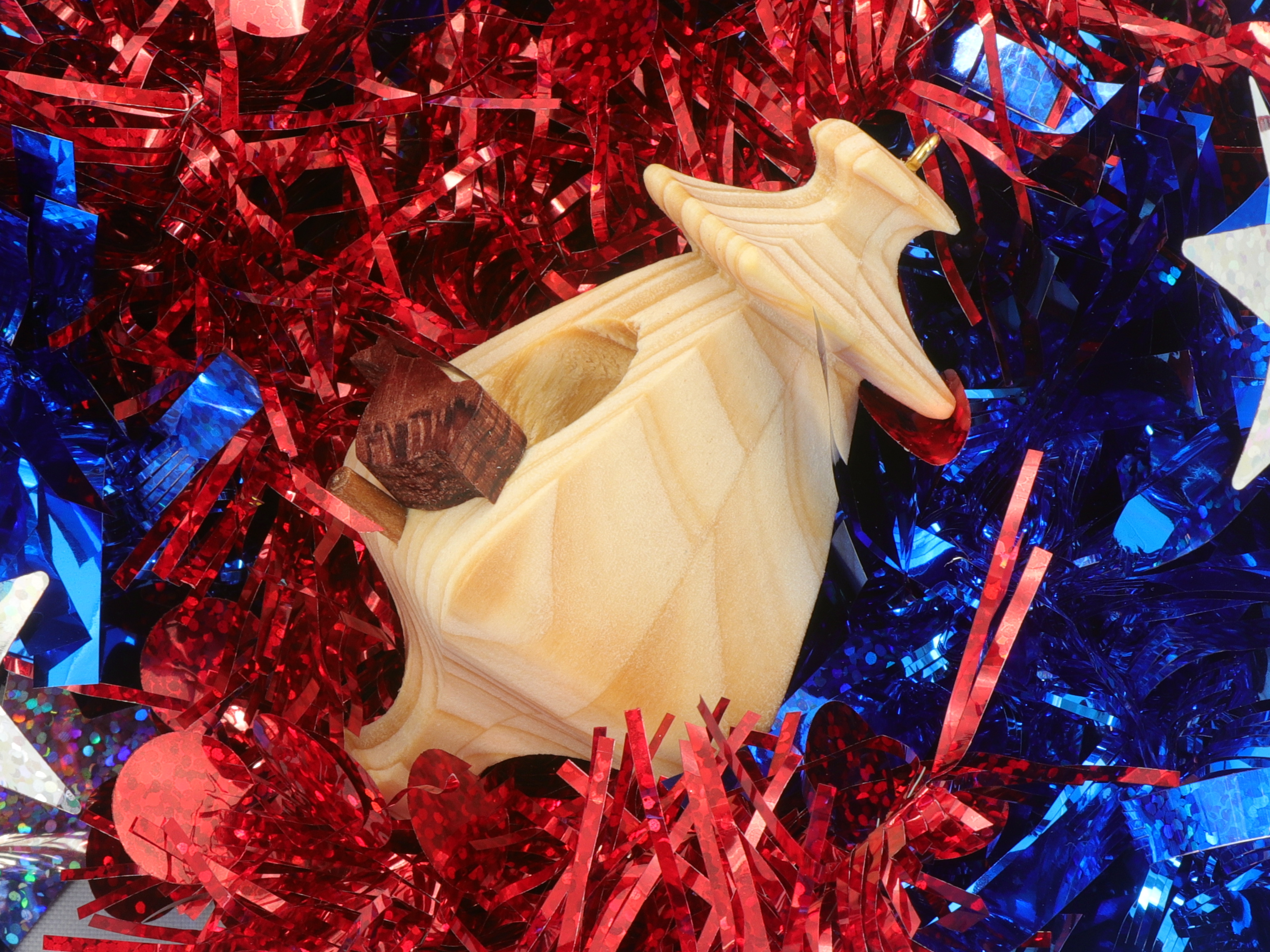 Handmade Wood Miniature Birdhouse Ornament crafted using only the finest select hardwoods and traditional woodworking tools. Each ornament is individually finished with a blend of mineral oil and beeswax to bring out the natural beauty of the wood.