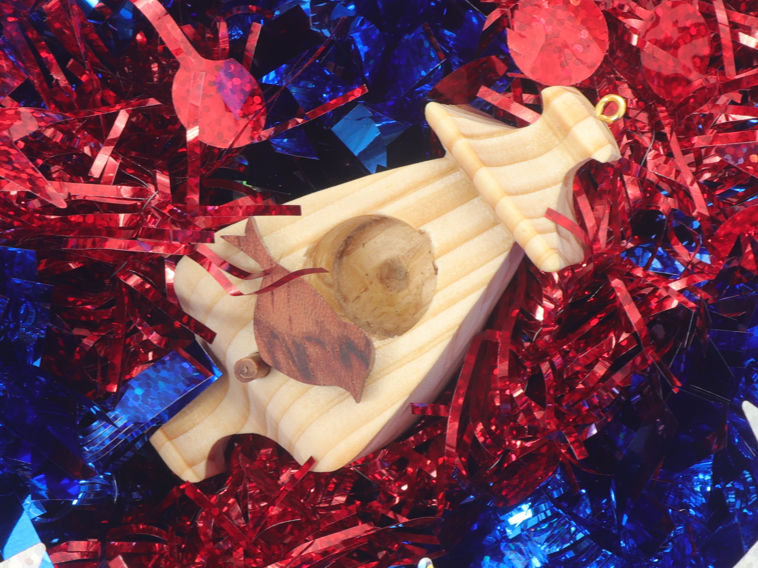 Handmade Wood Miniature Birdhouse Ornament crafted using only the finest select hardwoods and traditional woodworking tools. Each ornament is individually finished with a blend of mineral oil and beeswax to bring out the natural beauty of the wood.