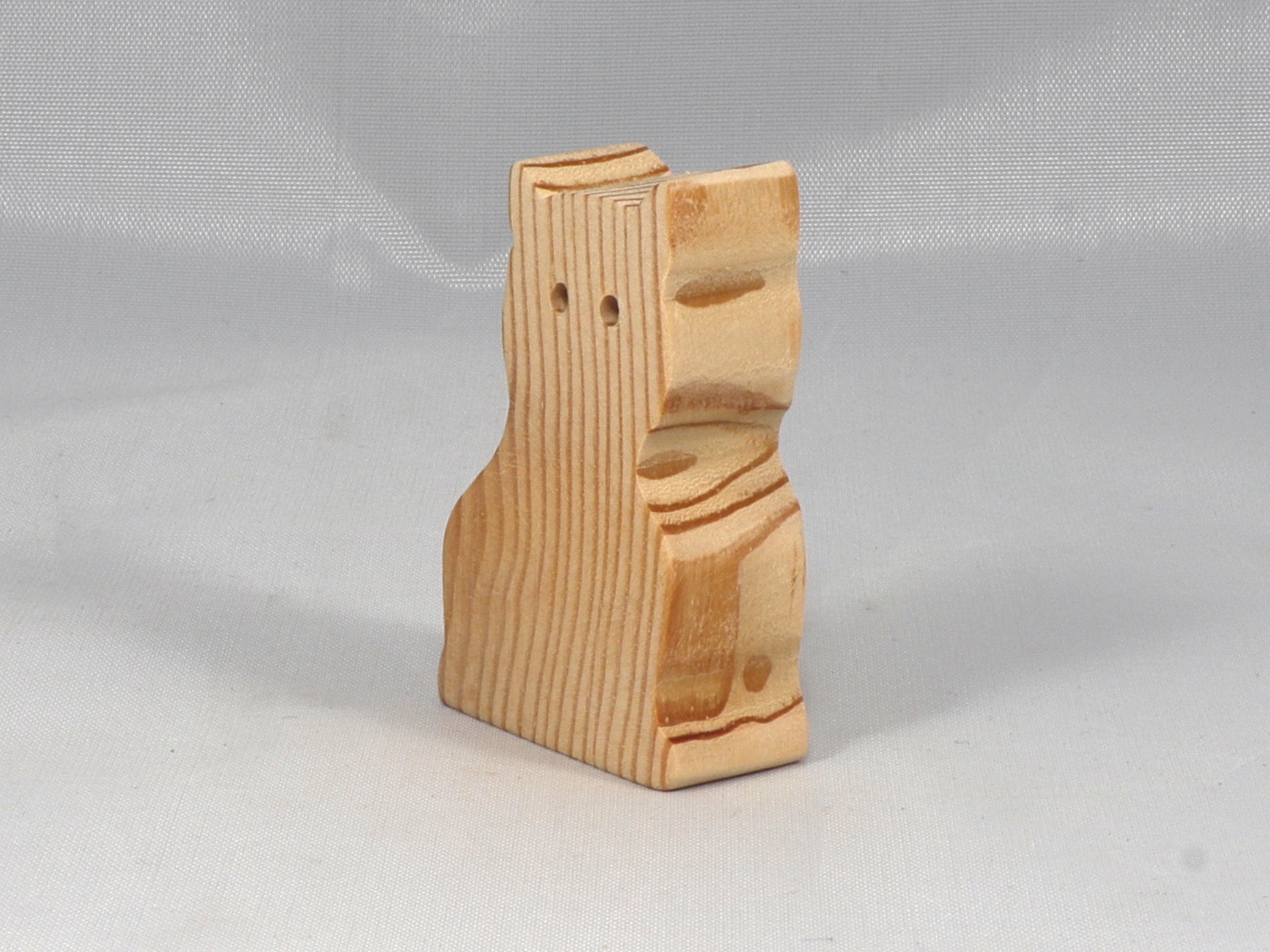 A handmade freestanding wooden toy cat cutout 1/2-3/4 inches thick is made from various kinds of wood sanded smooth and ready to paint. It is excellent for kids' crafts, pretend, or stacking toys. Other sizes are available with a custom order.
