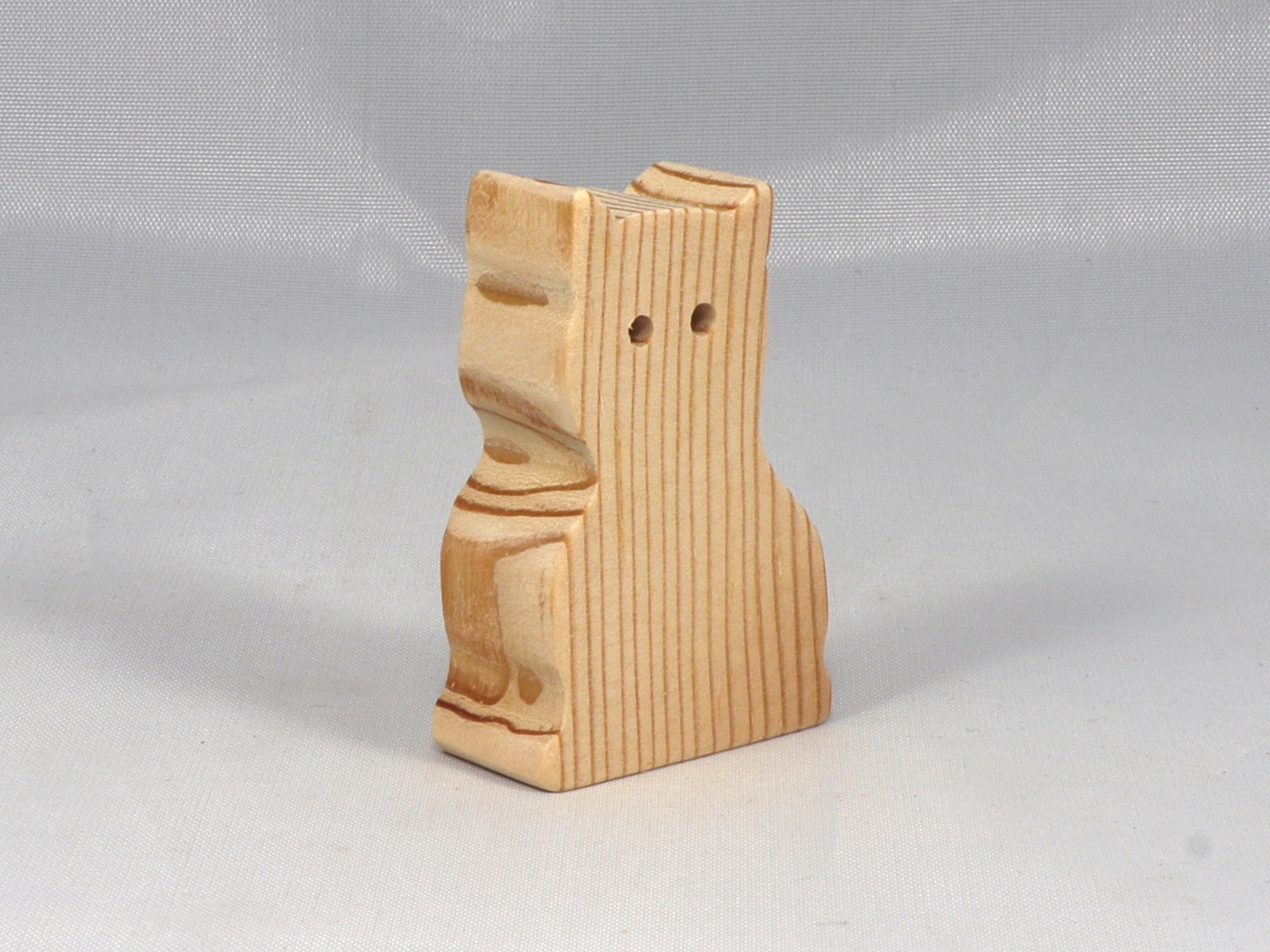 A handmade freestanding wooden toy cat cutout 1/2-3/4 inches thick is made from various kinds of wood sanded smooth and ready to paint. It is excellent for kids' crafts, pretend, or stacking toys. Other sizes are available with a custom order.