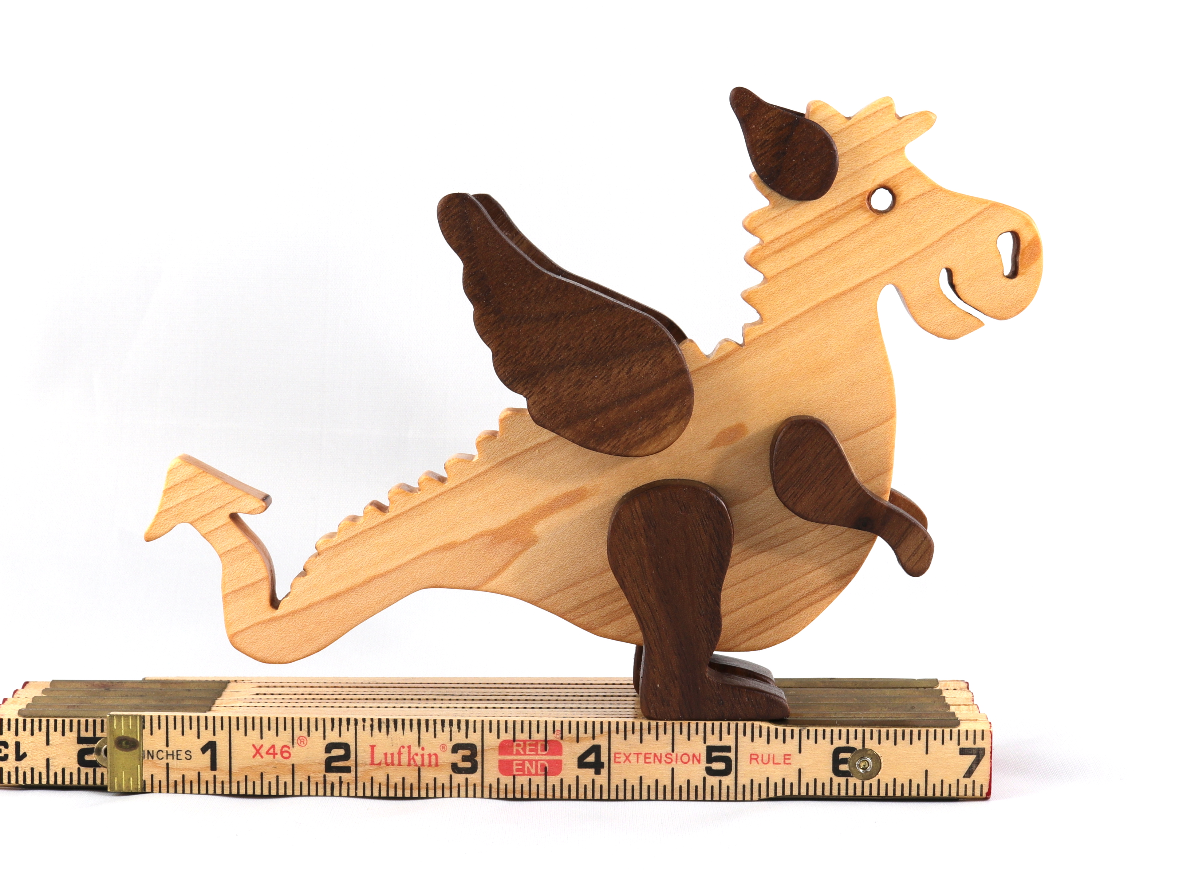 Baby wooden toy dragon.