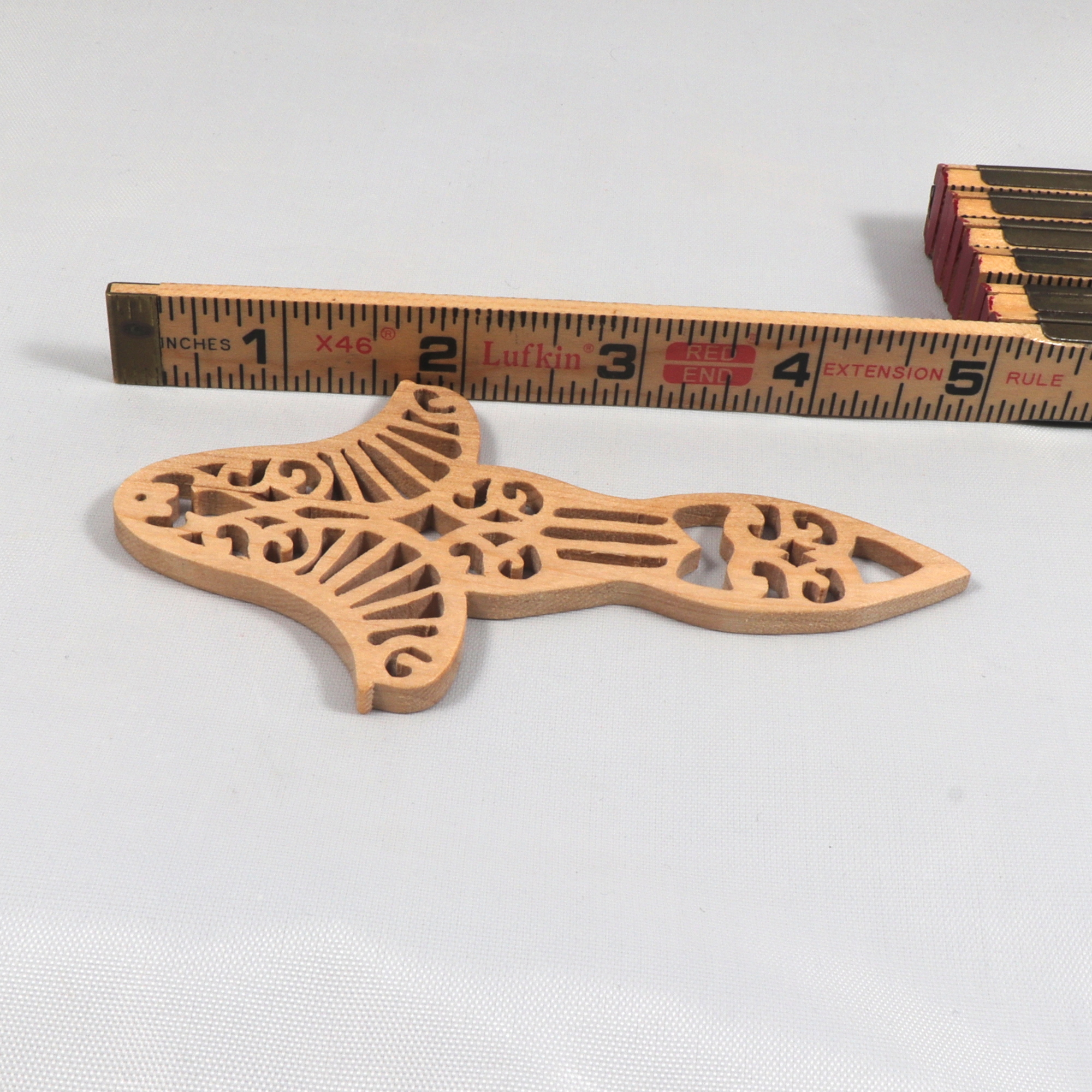 Handmade Wood Fretwork Victorian Icicle style Christmas tree ornament hand finished with clear shellac.