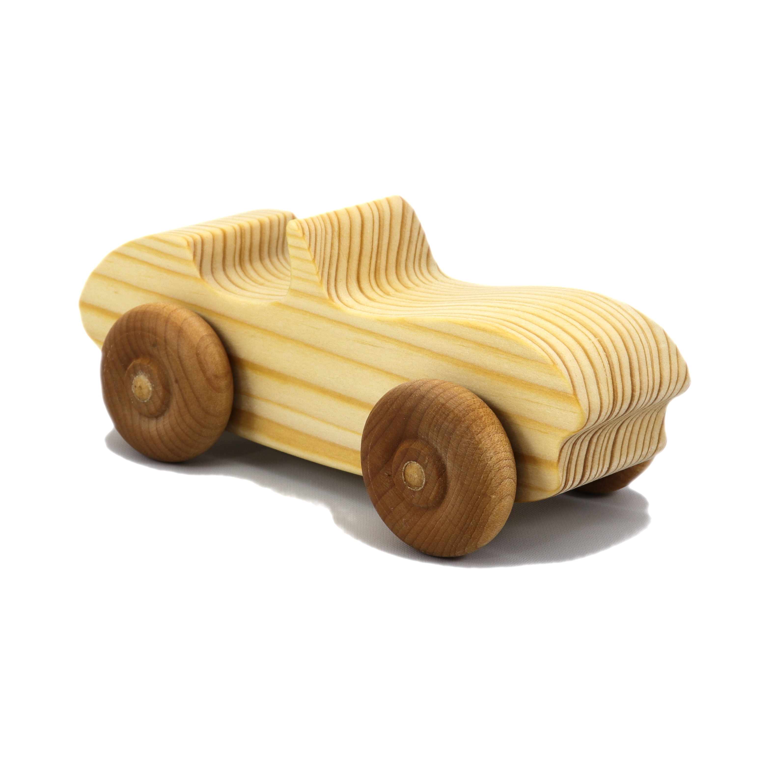 A handcrafted wooden toy convertible sports car, finished with a custom blend of oils and waxes, is the perfect gift for young children.
