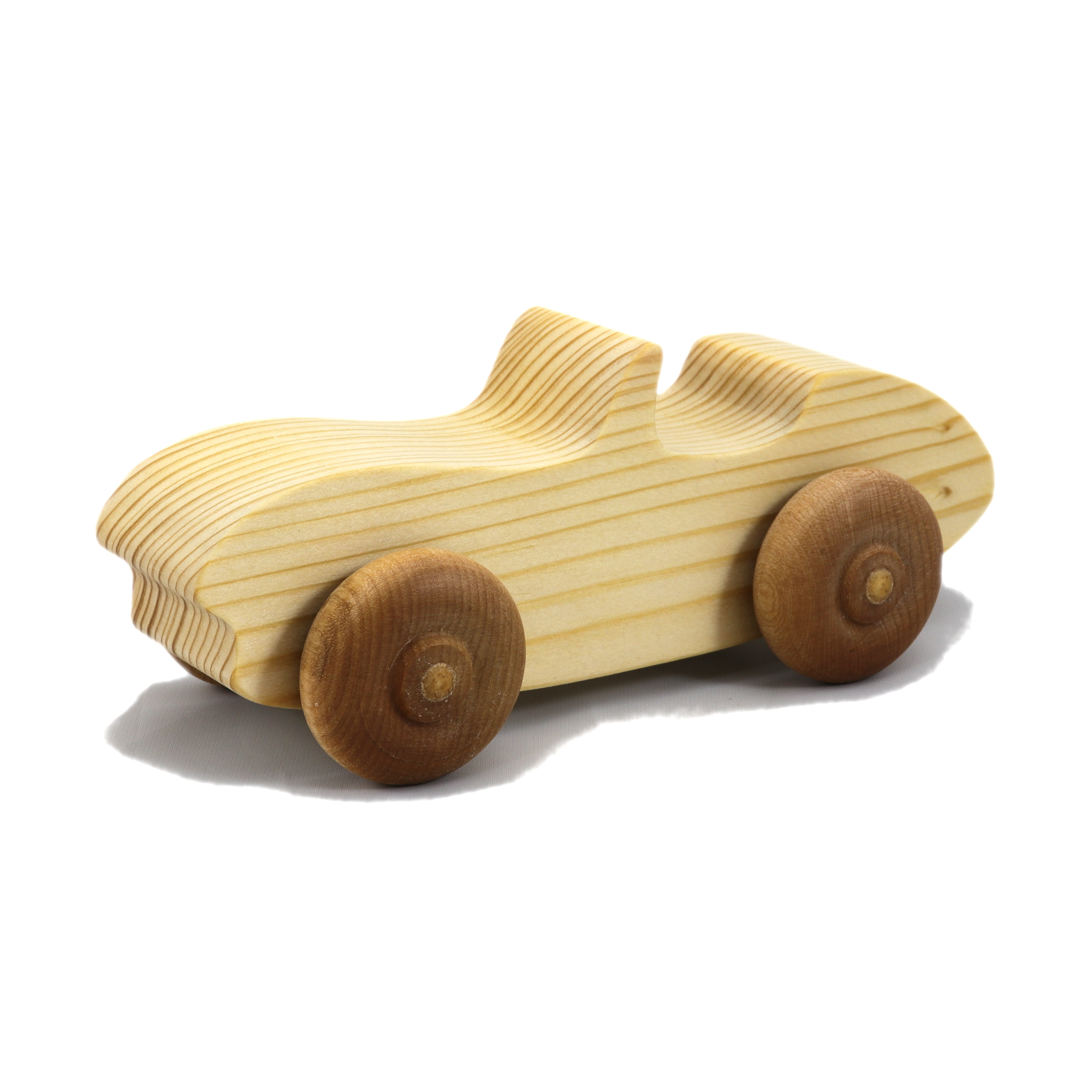 A handcrafted wooden toy convertible sports car, finished with a custom blend of oils and waxes, is the perfect gift for young children.