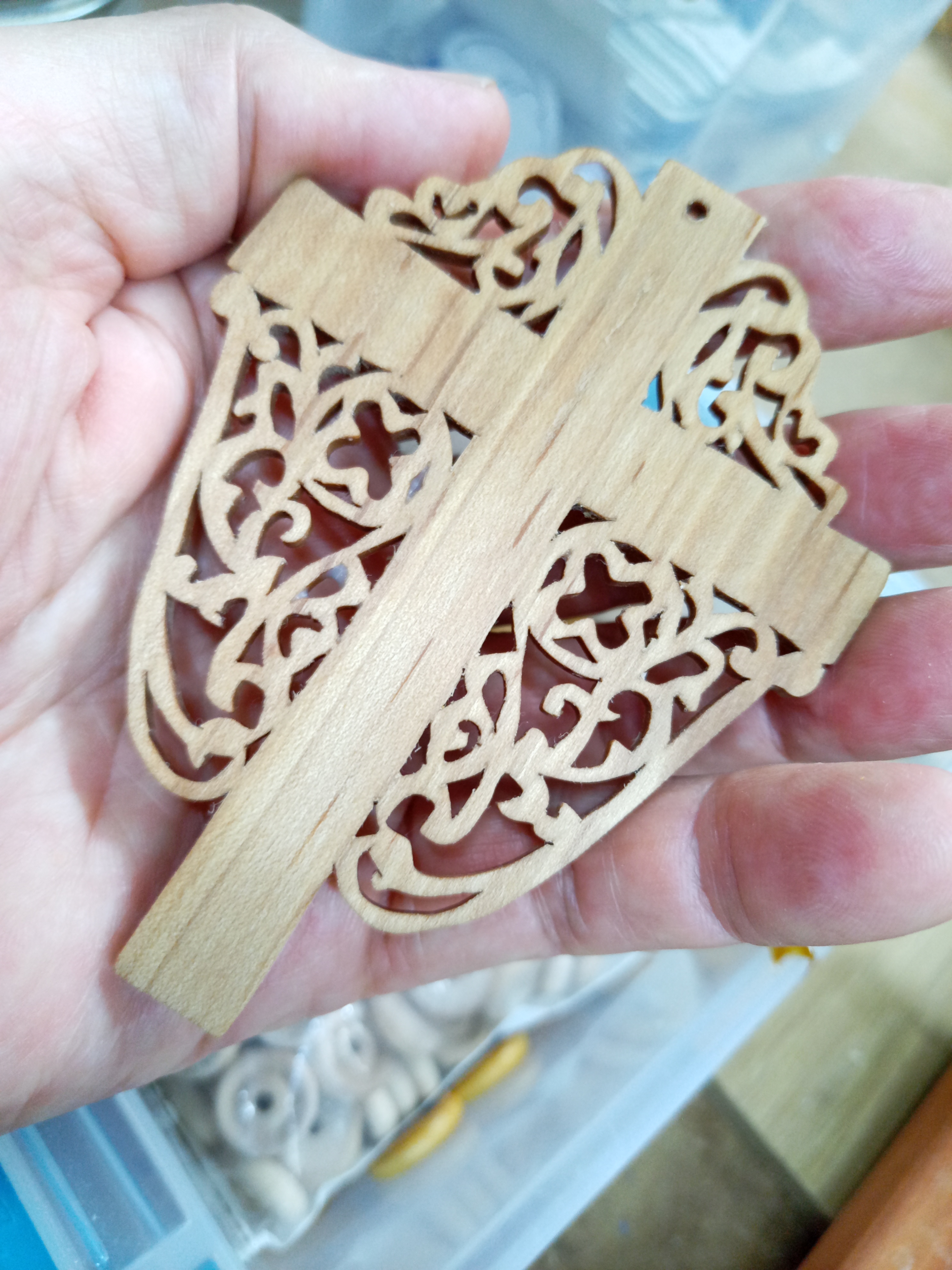 This handmade Christian cross features a Victorian-style fretwork design, making it a perfect ornament for Easter, Christmas, or home decor.