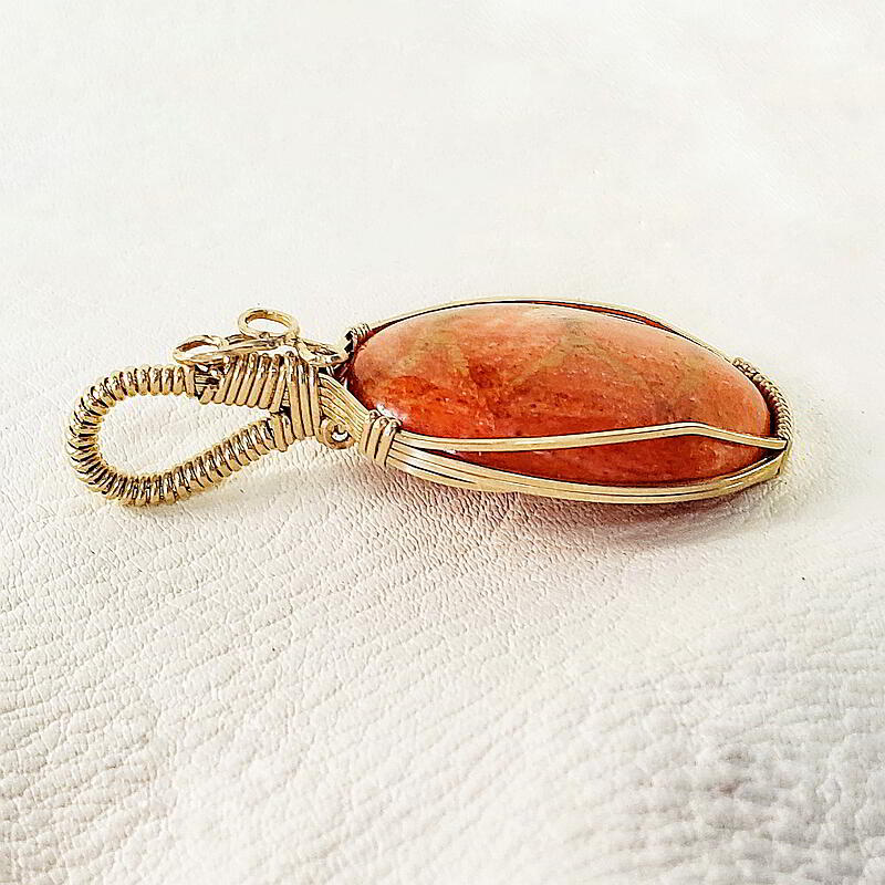 Gold wire wrapped stone pendants top