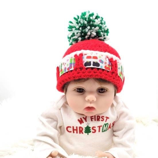 My first christmas shops hat and booties