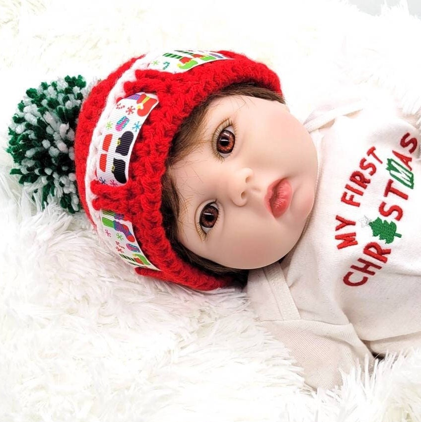 My first christmas shops hat and booties