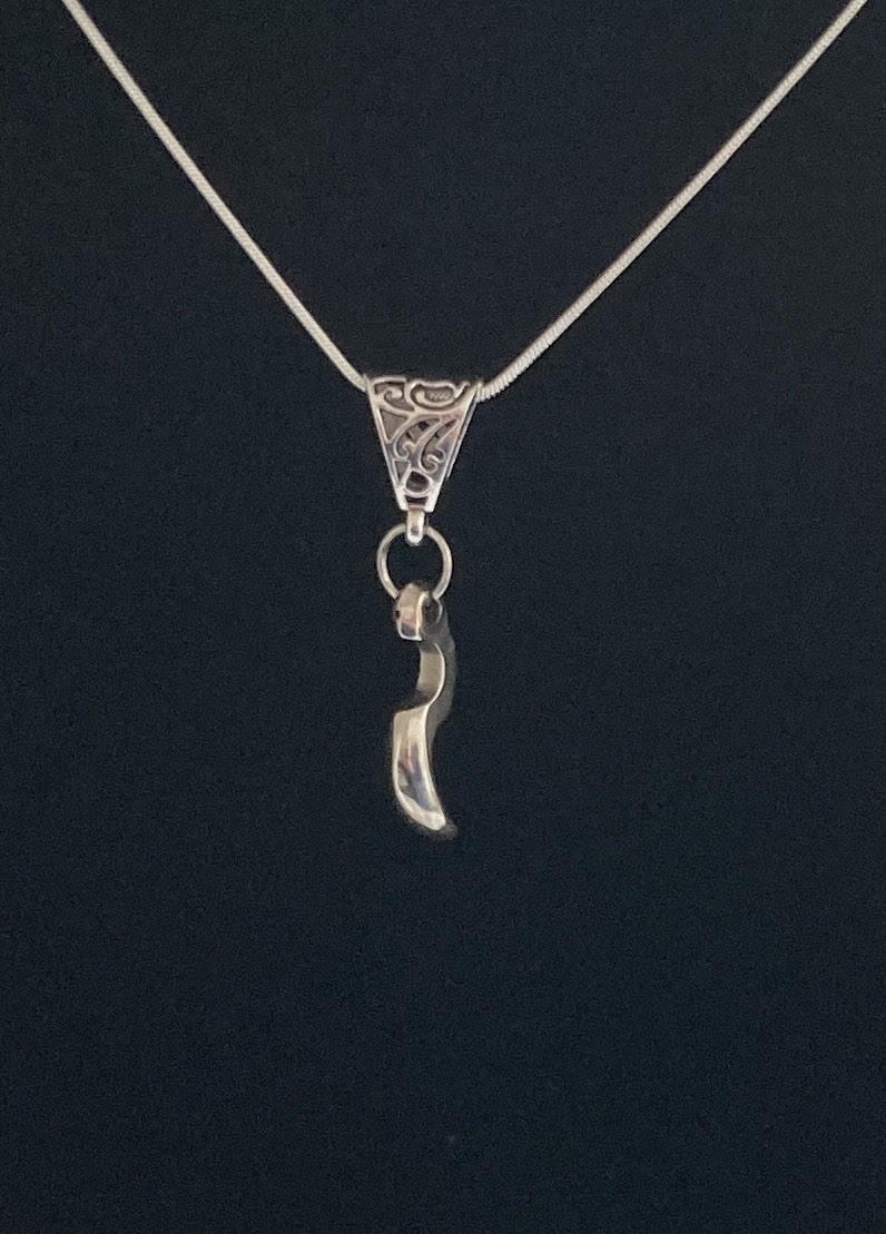 An abstract trill lever made in sterling silver is  a unique unisex necklace.  It is on a 16" snake chain and  antique style bail.  This is truly a gift of a special gift.