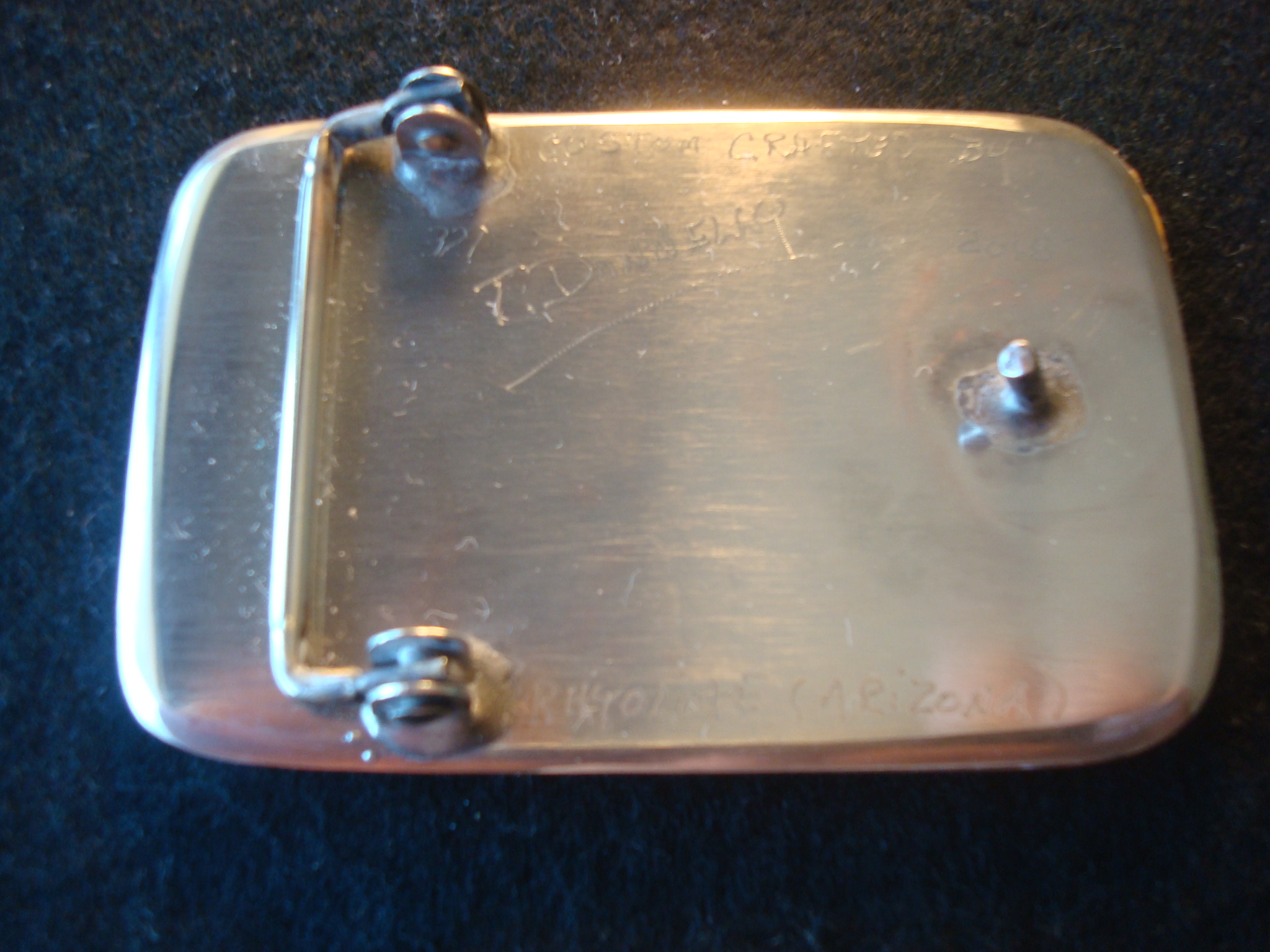 Handmade German Silver backing with beveled edges, engraved with the artist's signature,date created and the identification of the gemstone. Handmade German Silver backing with beveled edges, engraved with the artist's signature,date created and the identification of the gemstone.