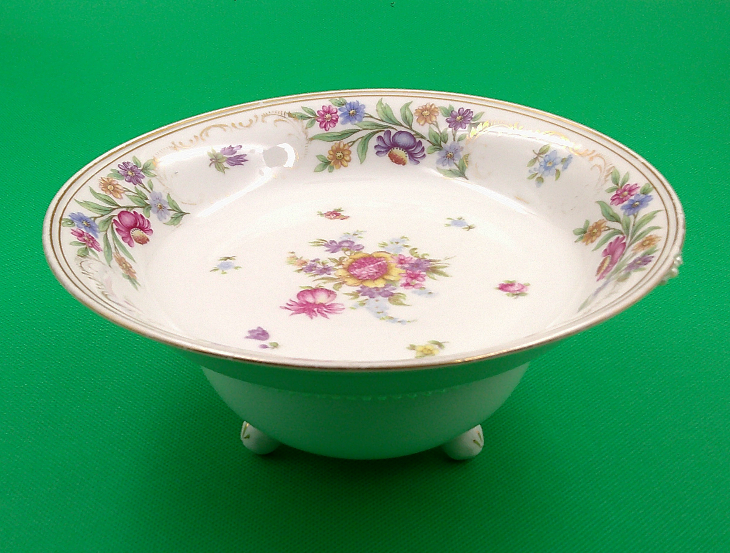 This pretty jewelry dish is actually 2 bowls combined, and the one on the bottom is perfect with feet.  This pretty jewelry dish is actually 2 bowls combined, and the one on the bottom is perfect with feet.