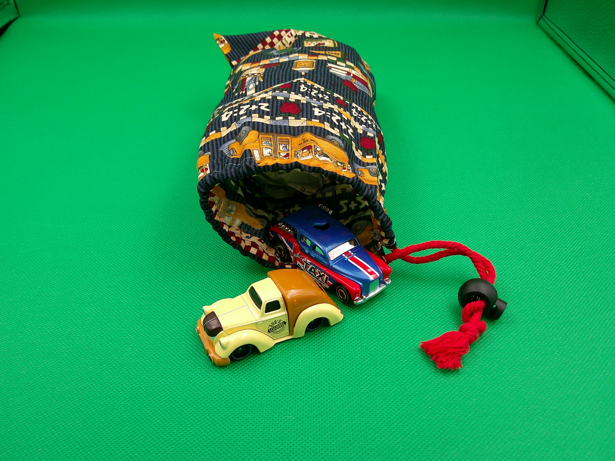 It is 2 sided but can hold a lot like these small cars. Cars are not included with this bag. Just an example. It is 2 sided but can hold a lot like these small cars. Cars are not included with this bag. Just an example.