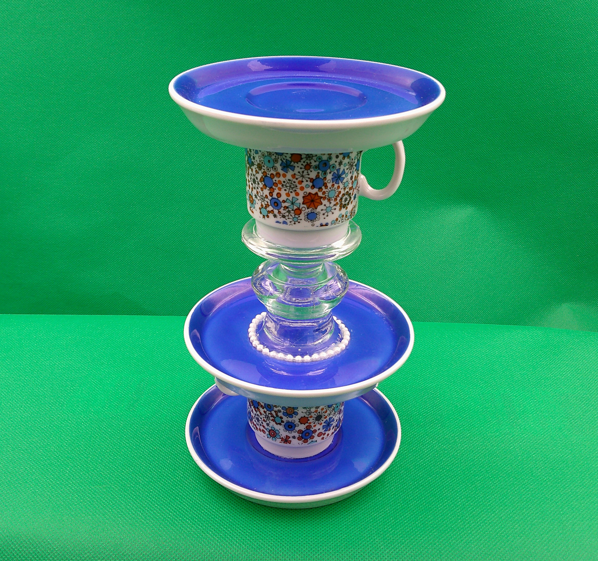 Another view showing the details of all the flower designs in the cup. Another view showing the details of all the flower designs in the cup.