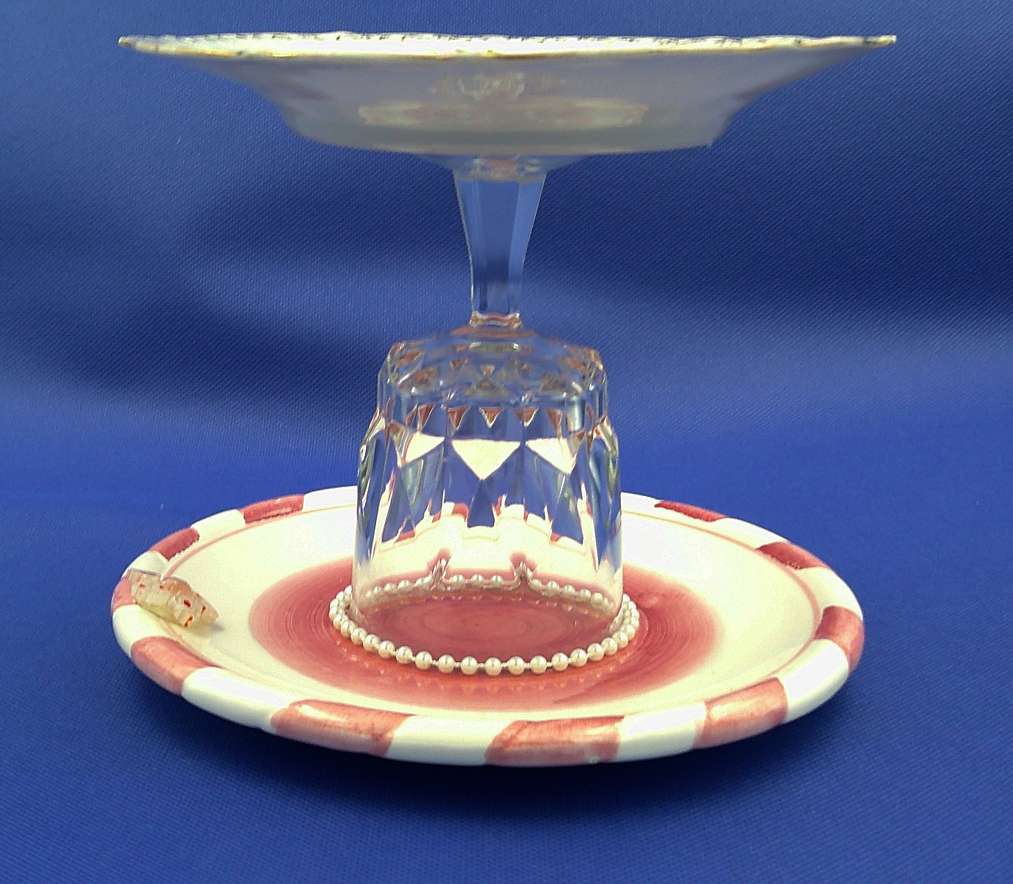 A side view of the lollypop jewelry dish. It's about 6 inches high by 7 inches wide. A side view of the lollypop jewelry dish. It's about 6 inches high by 7 inches wide.