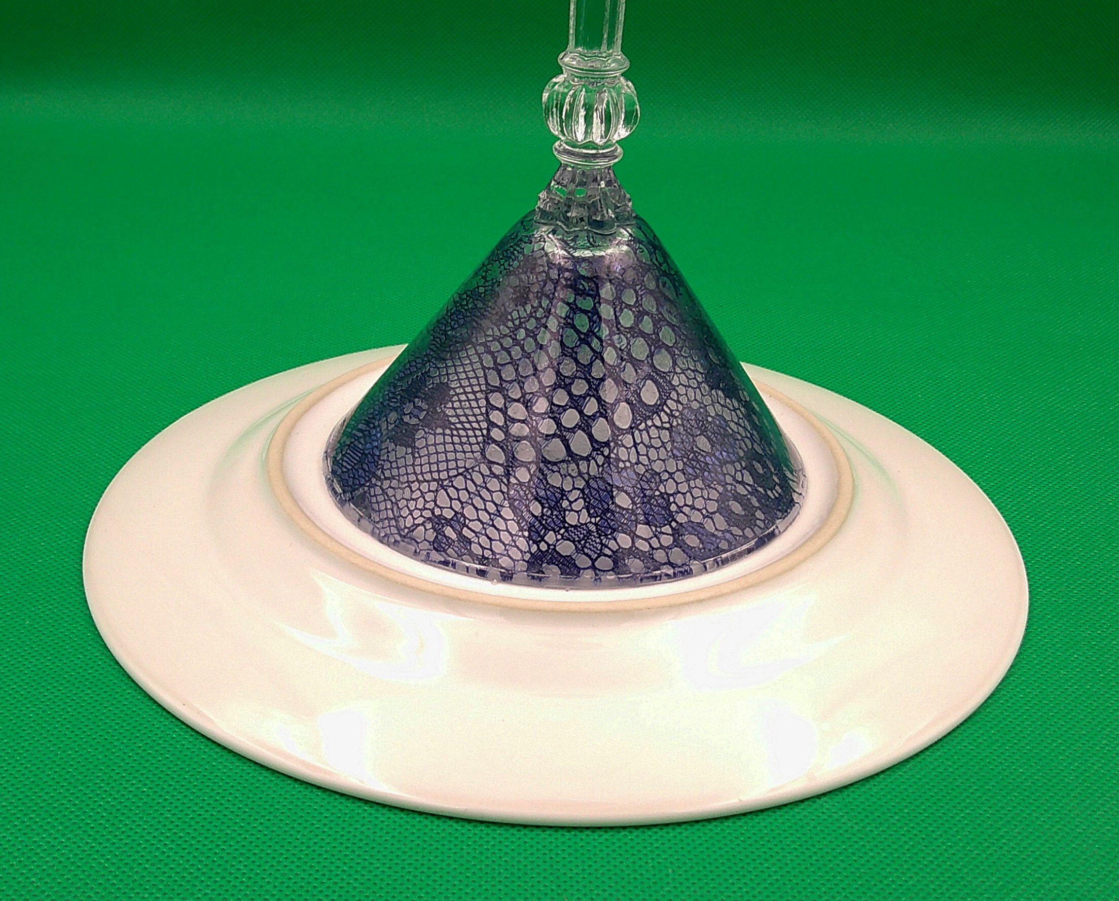 This view of the dish upside down gives a great view of the beautiful cobalt blue lace inside the glass. This view of the dish upside down gives a great view of the beautiful cobalt blue lace inside the glass.