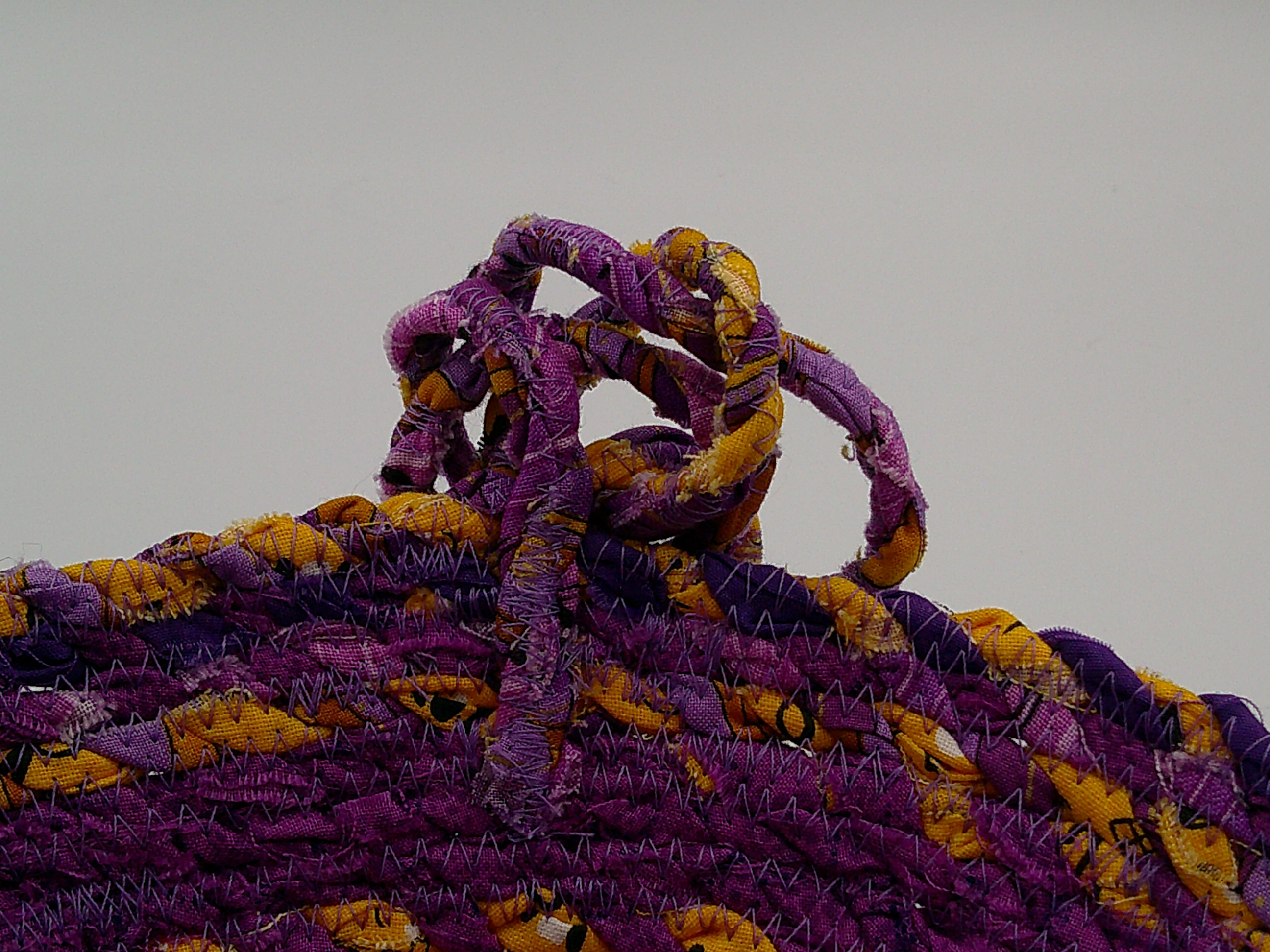 A view of the knot from the inside of the bowl, showing all of the twists. A view of the knot from the inside of the bowl, showing all of the twists.